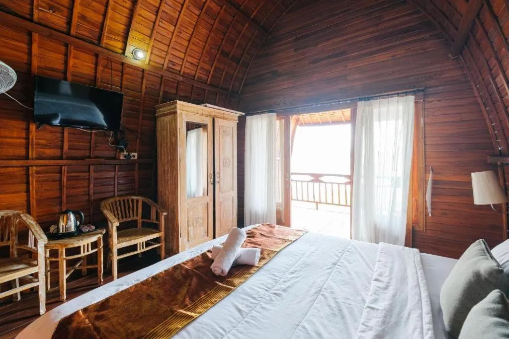 Bed in Villa Kedisan Lakeview
