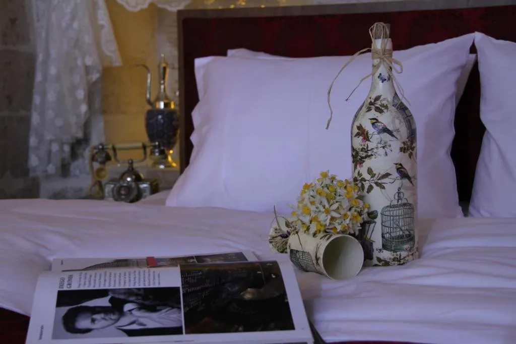 Bed in Tuğhan Hotel