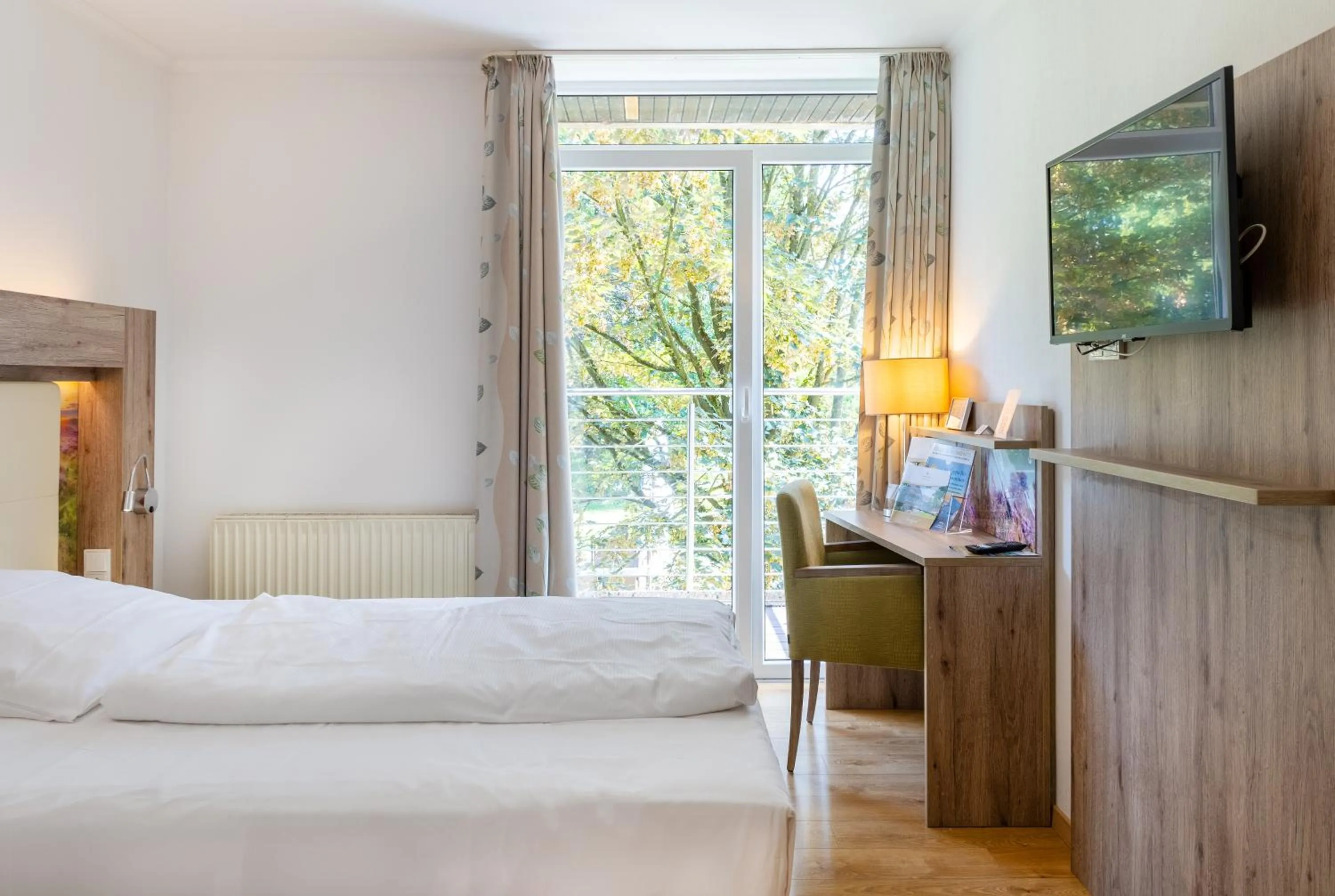 Photo of the whole room, Bed in Hotel Landhaus Höpen