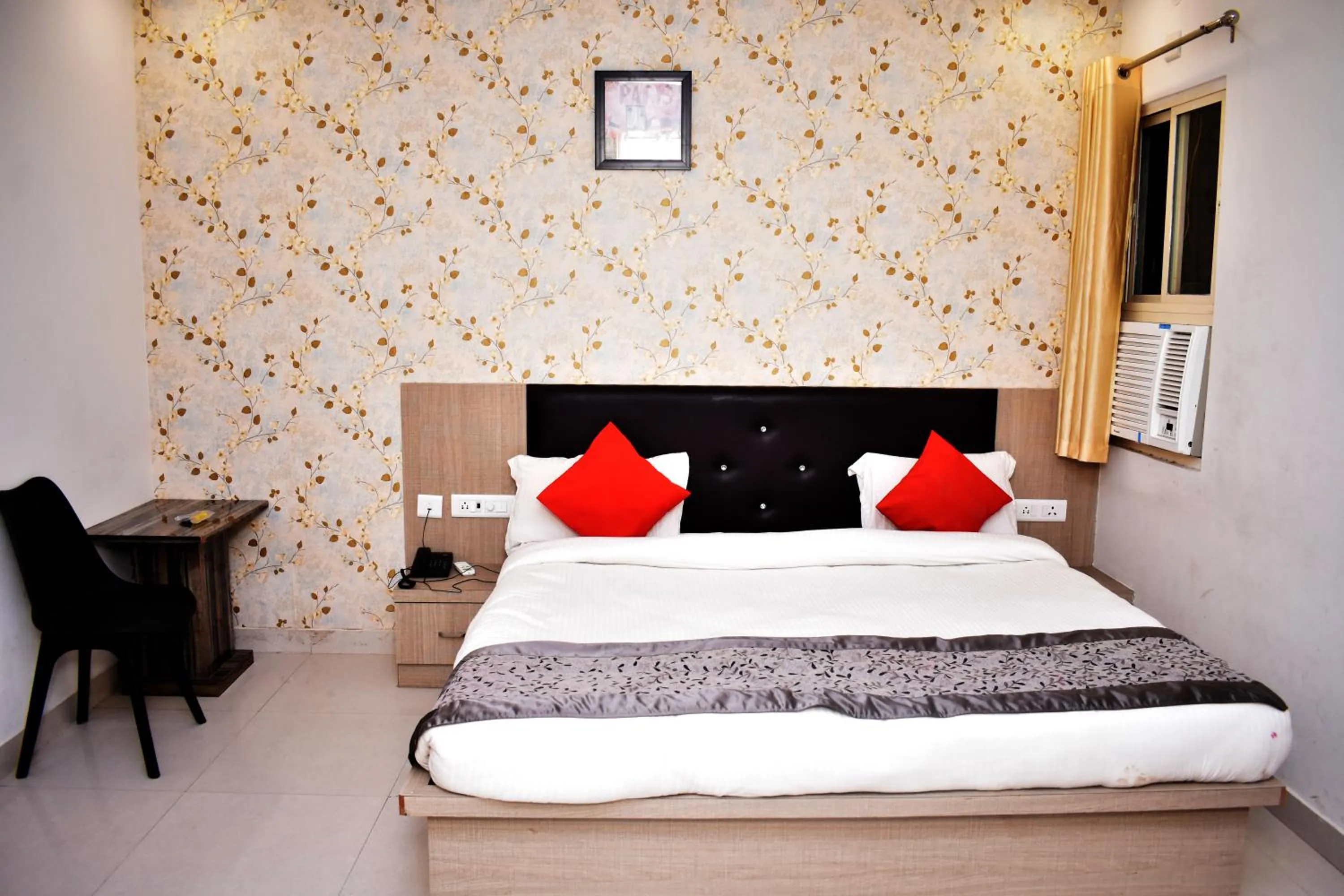 Photo of the whole room, Bed in HOTEL UMA PALACE