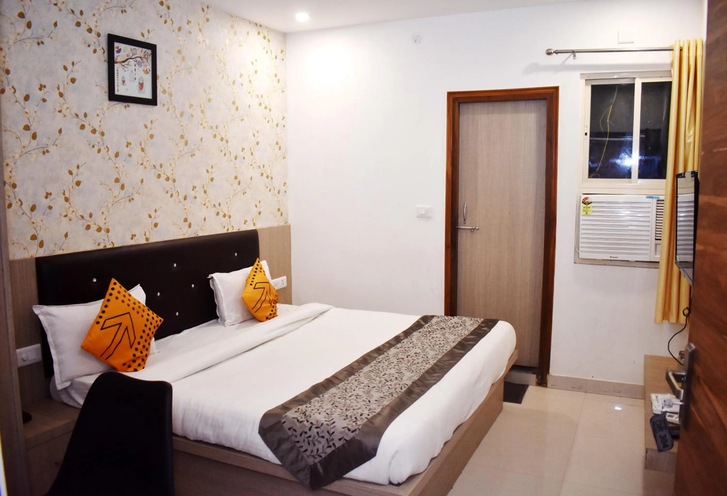 Photo of the whole room, Bed in HOTEL UMA PALACE