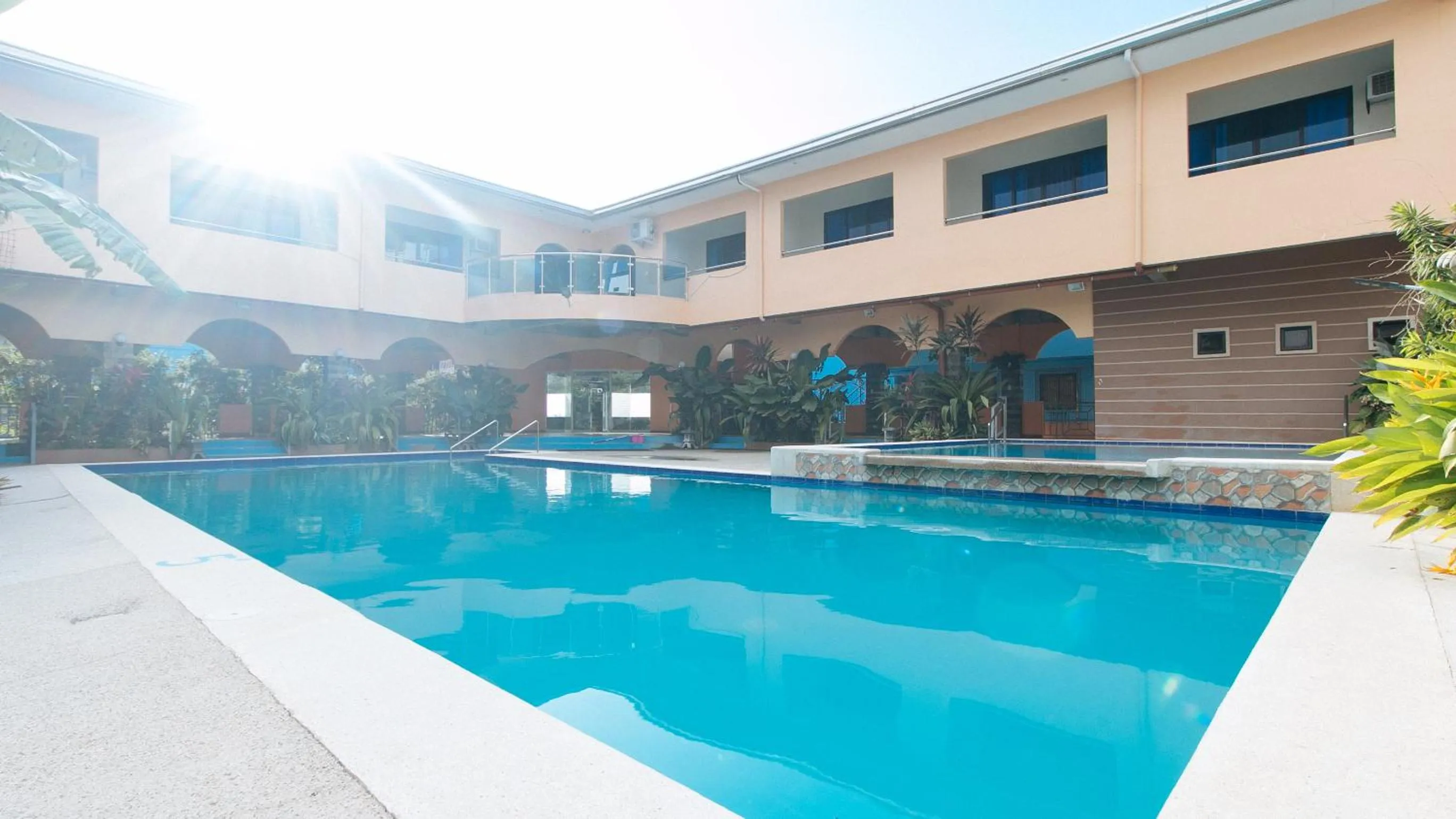 Swimming pool in RedDoorz Plus near Municipality of Luisiana Laguna