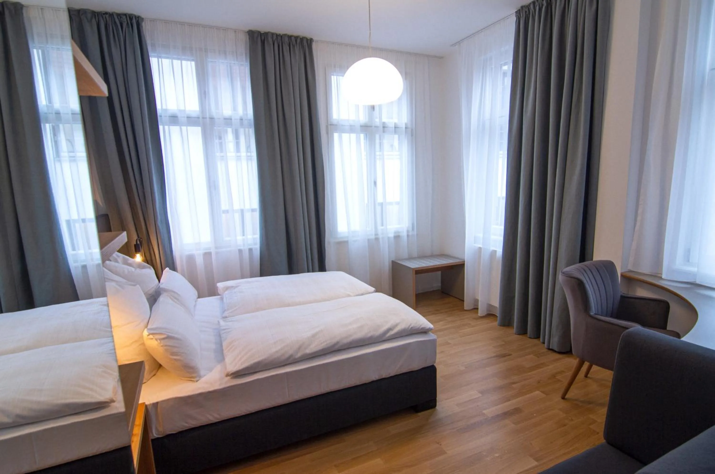 Photo of the whole room, Bed in Le Baldinger Boutique Hotel
