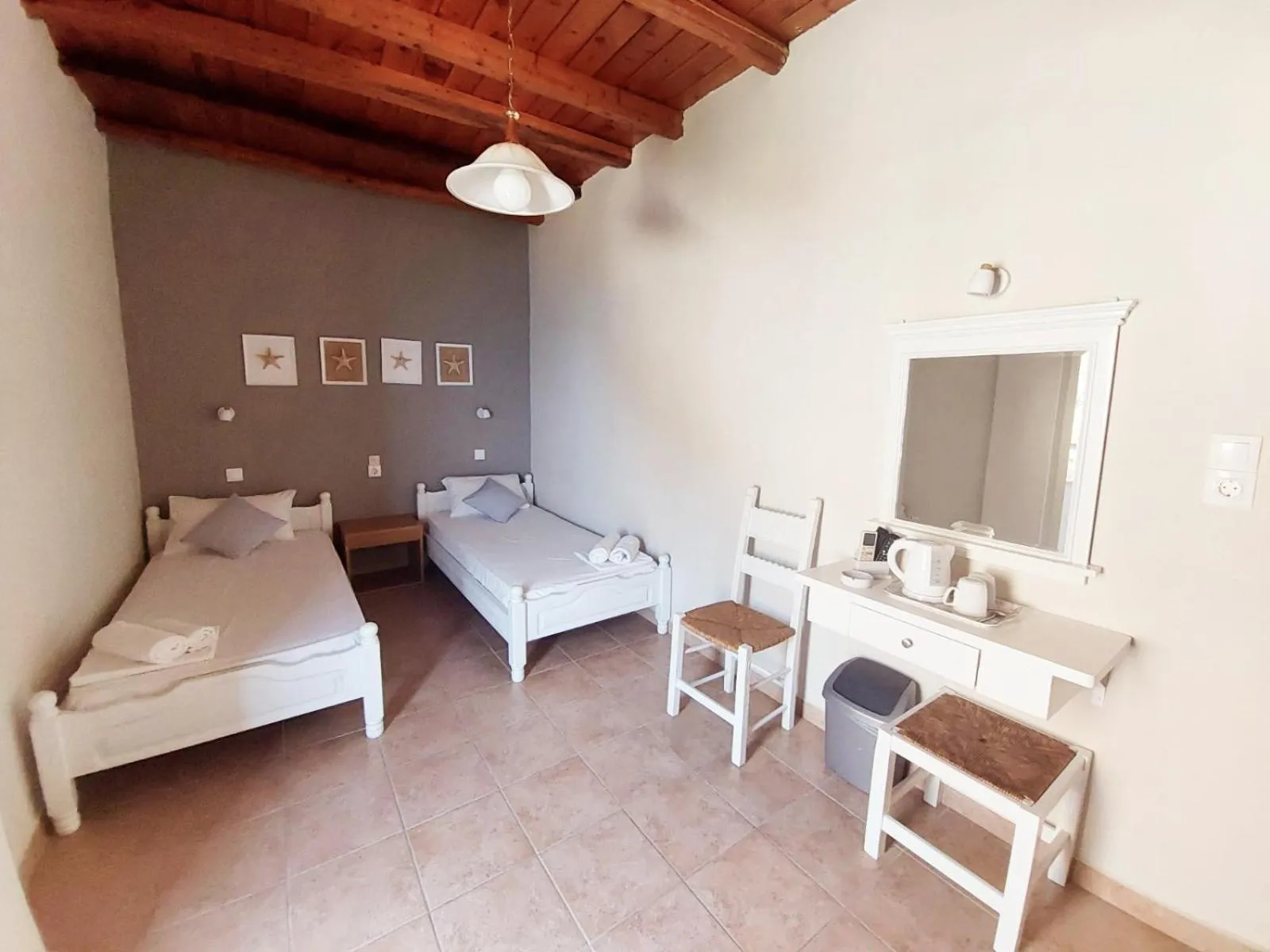 Photo of the whole room, Bed in Agia Roumeli Hotel adults only