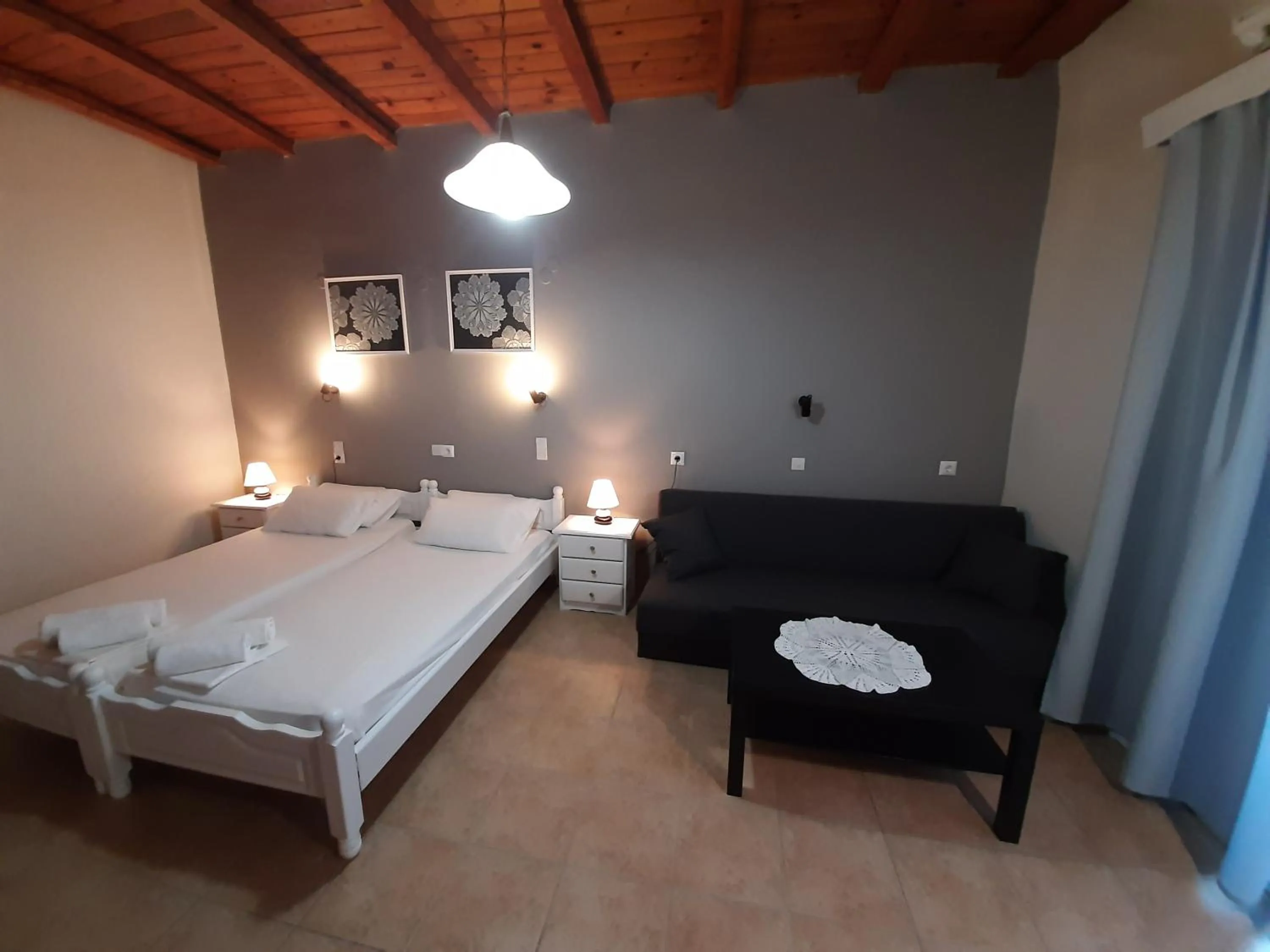 Photo of the whole room, Bed in Agia Roumeli Hotel adults only