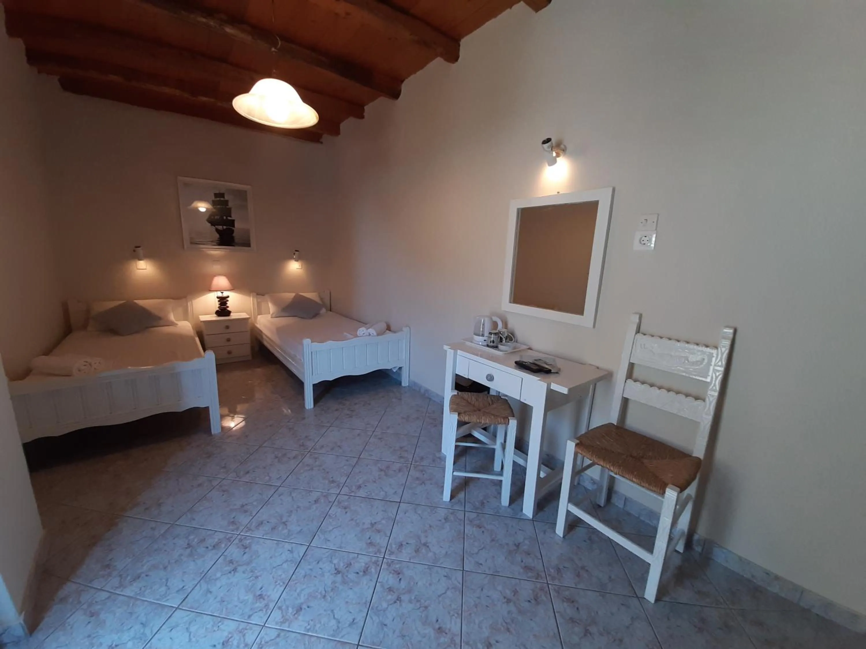 Photo of the whole room, Bed in Agia Roumeli Hotel adults only