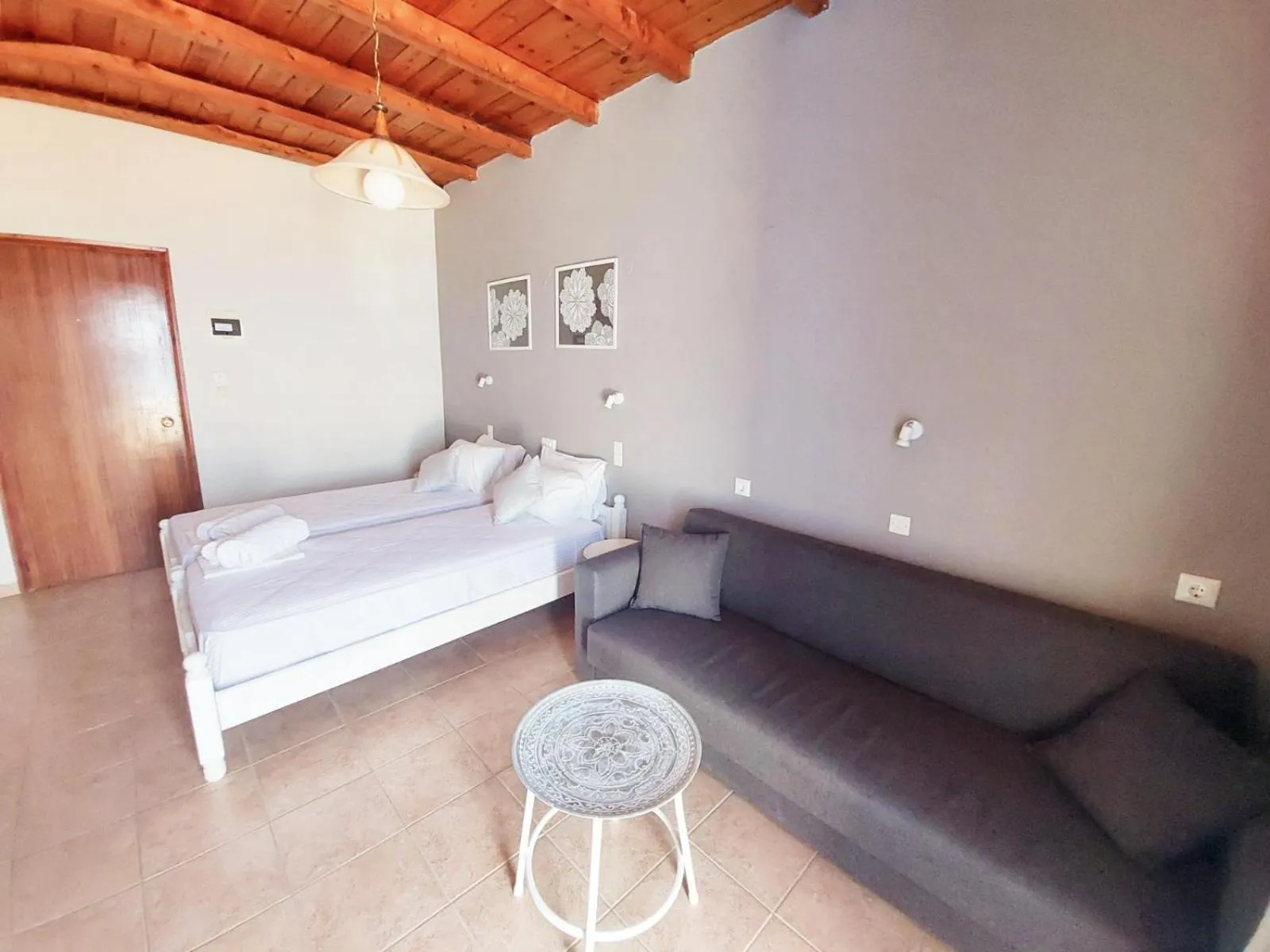 Living room, Bed in Agia Roumeli Hotel adults only