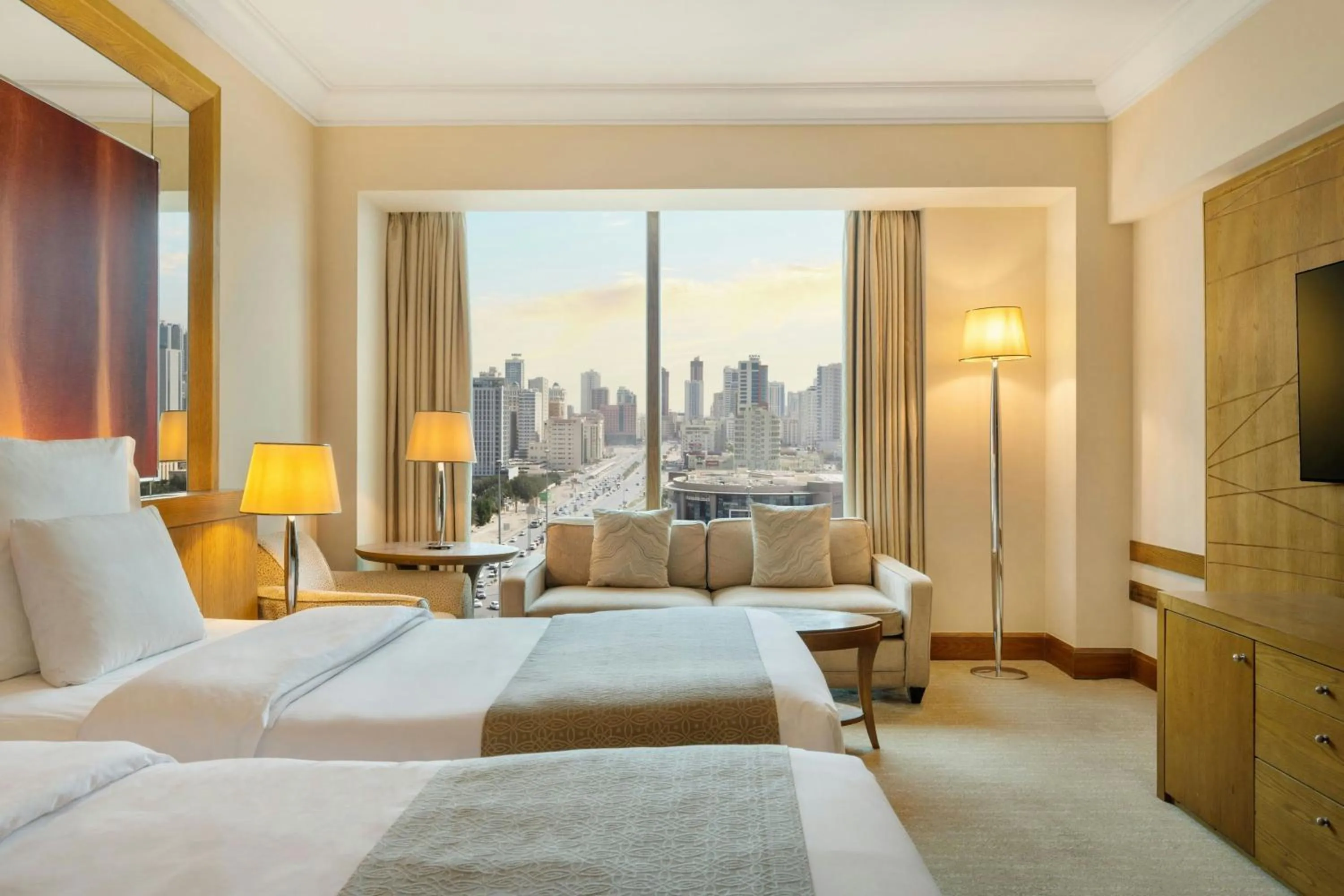 Photo of the whole room, Bed in Gulf Hotel Bahrain Convention and SPA