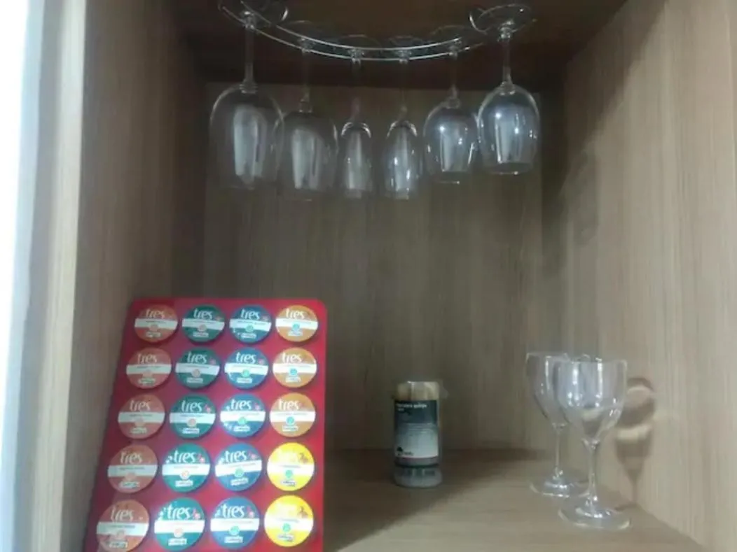 Living room in Suíte Charmosa em Pedra Azul