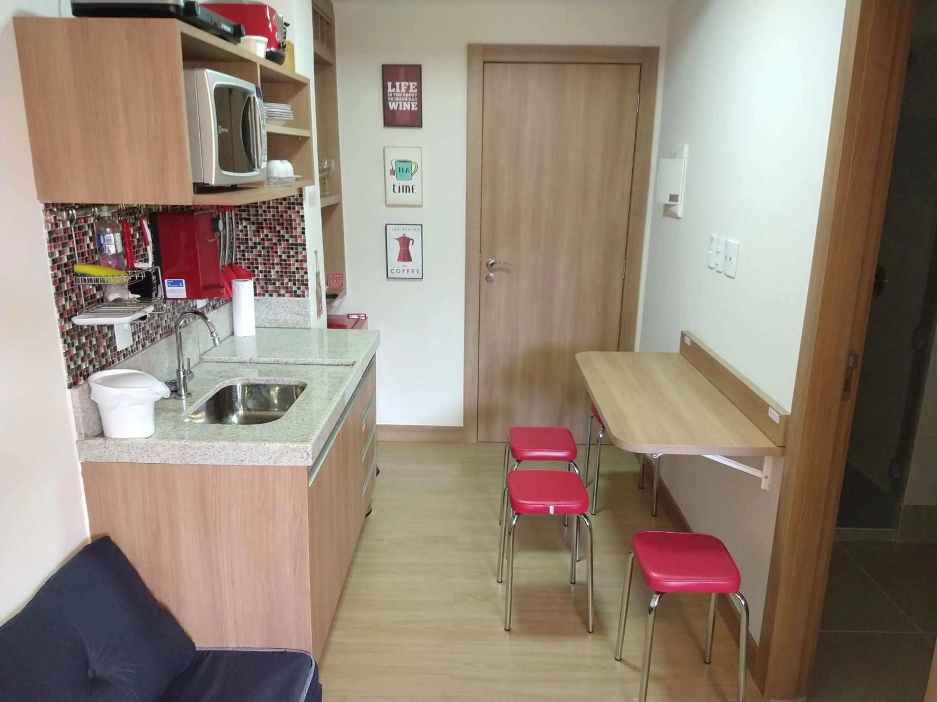 Living room in Suíte Charmosa em Pedra Azul