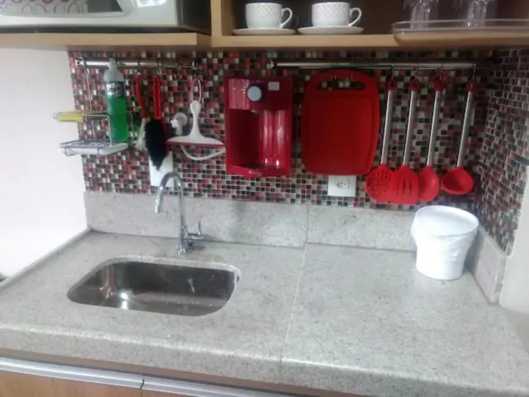 Living room in Suíte Charmosa em Pedra Azul