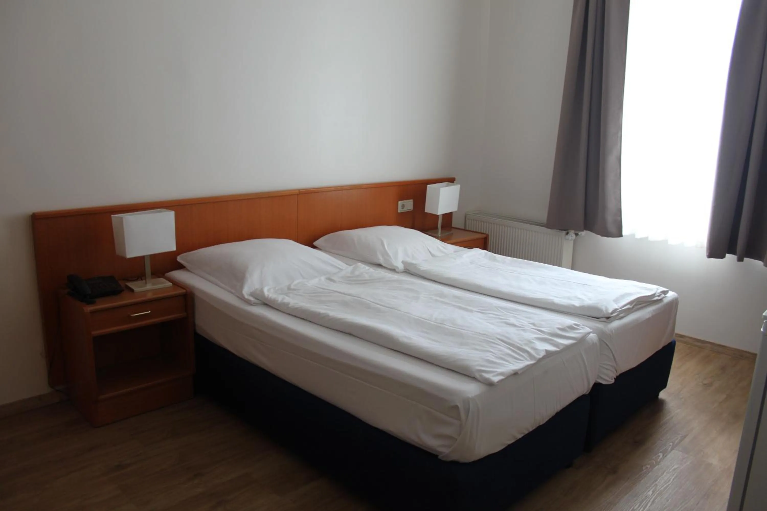 Photo of the whole room, Bed in Stadt-Gut-Hotel Zum Rathaus