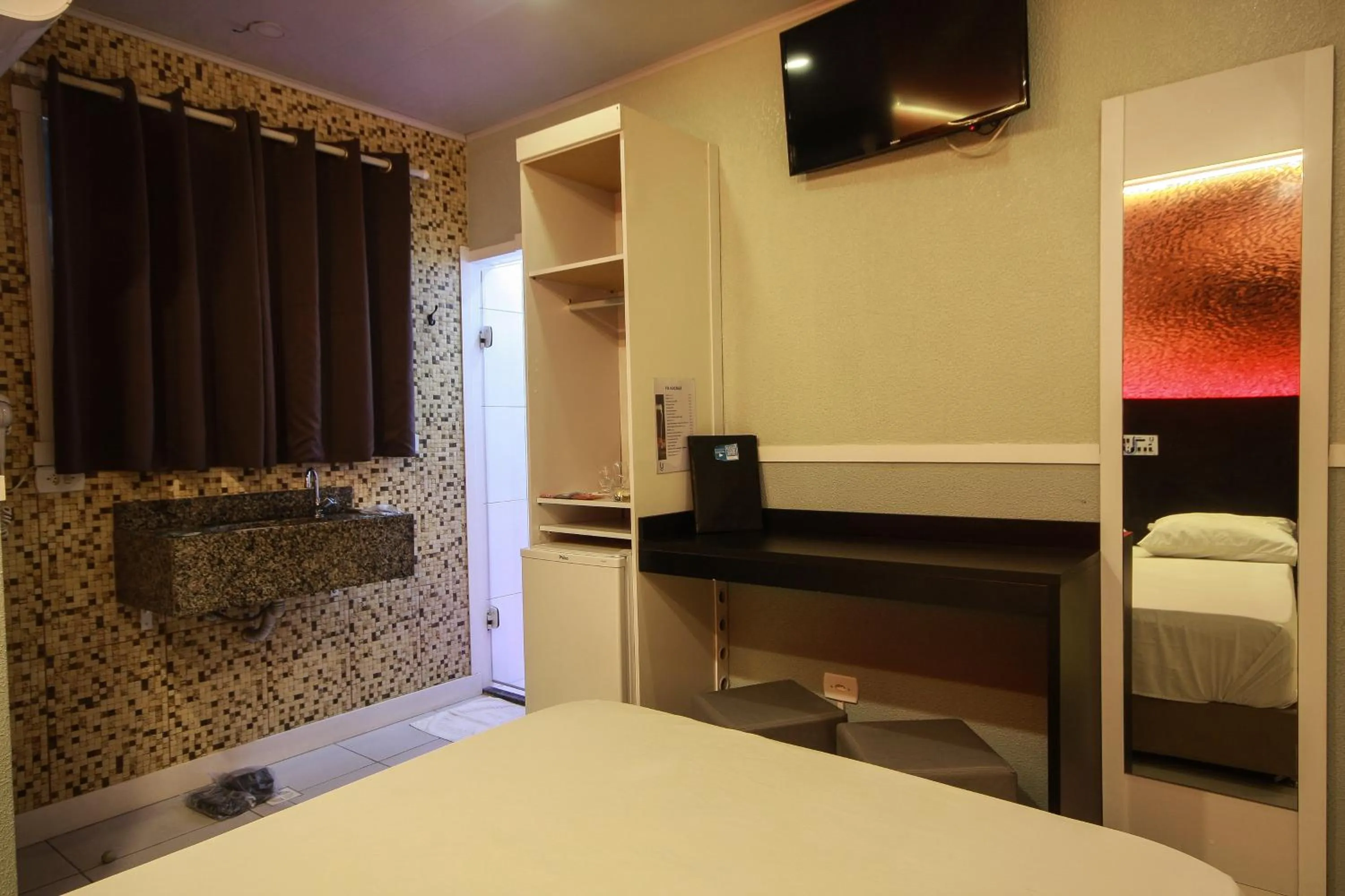 Bed in Único Motel Faria Lima