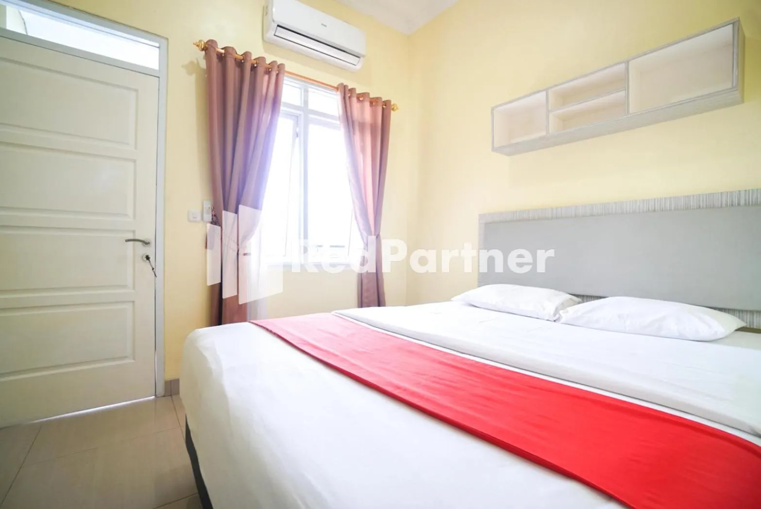 Bed in Indah Residence Syariah Mitra RedDoorz