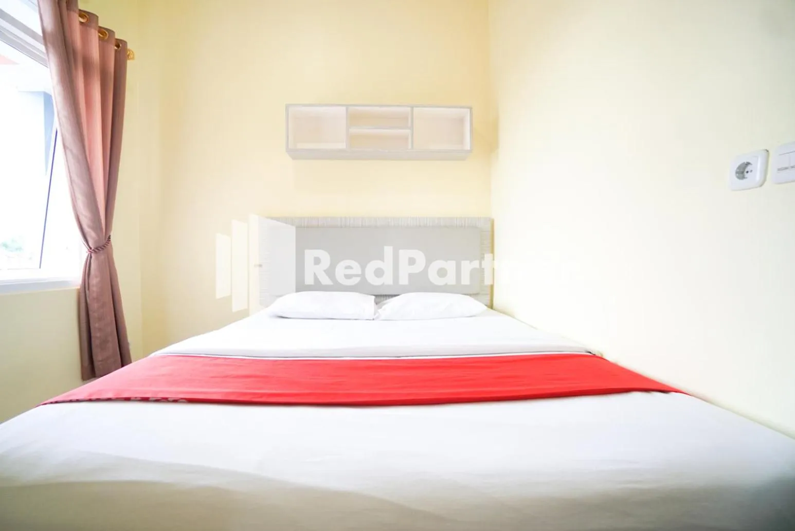 Bed in Indah Residence Syariah Mitra RedDoorz
