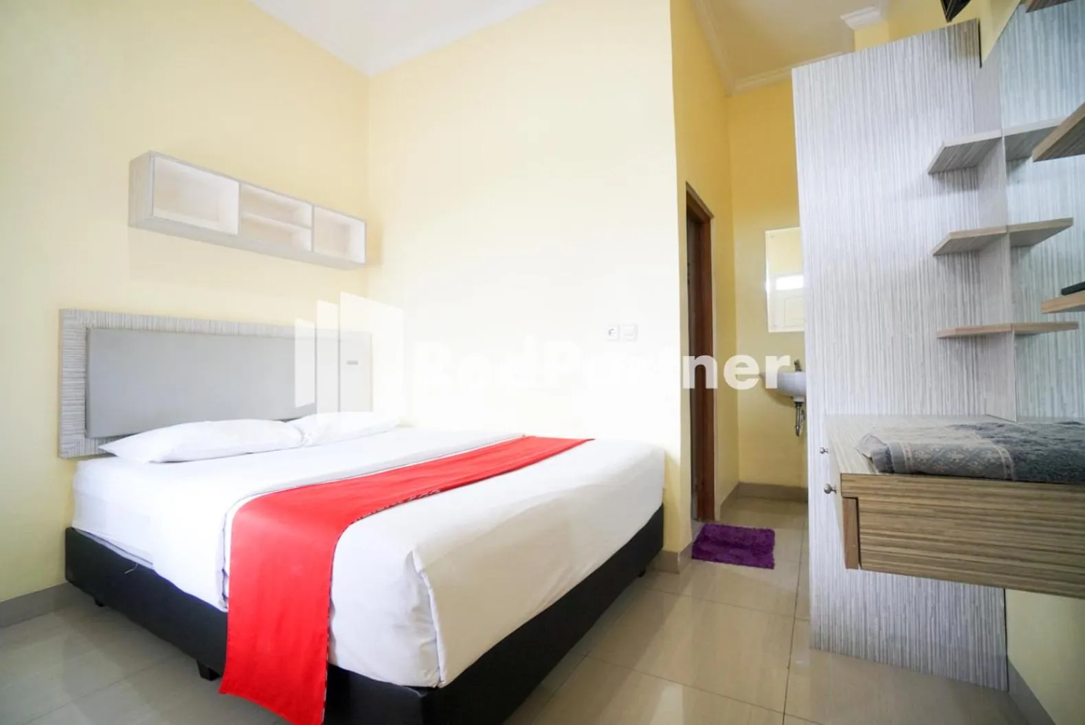 Bed in Indah Residence Syariah Mitra RedDoorz