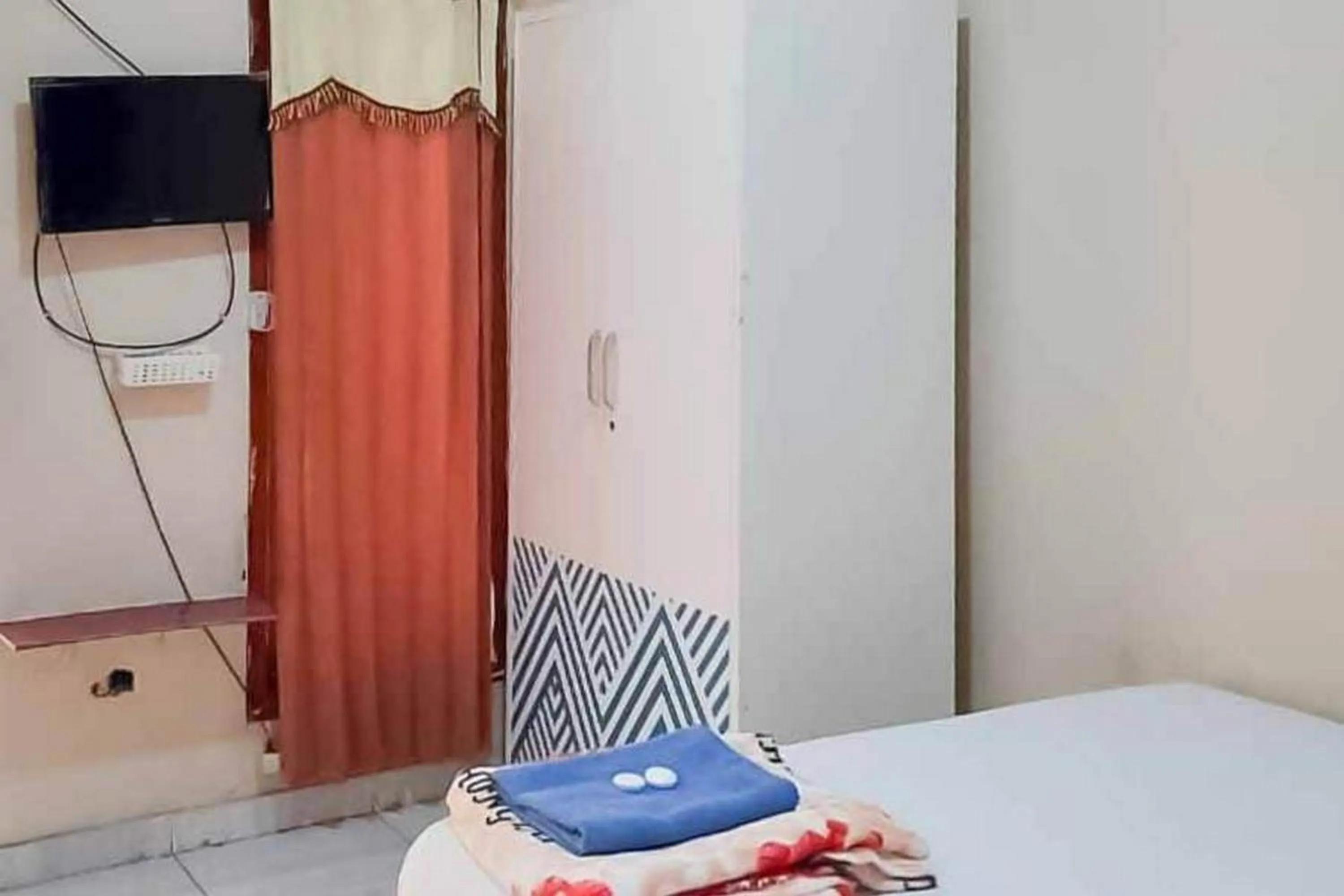 Bedroom, Bed in Pakansari Guest Inn Mitra RedDoorz