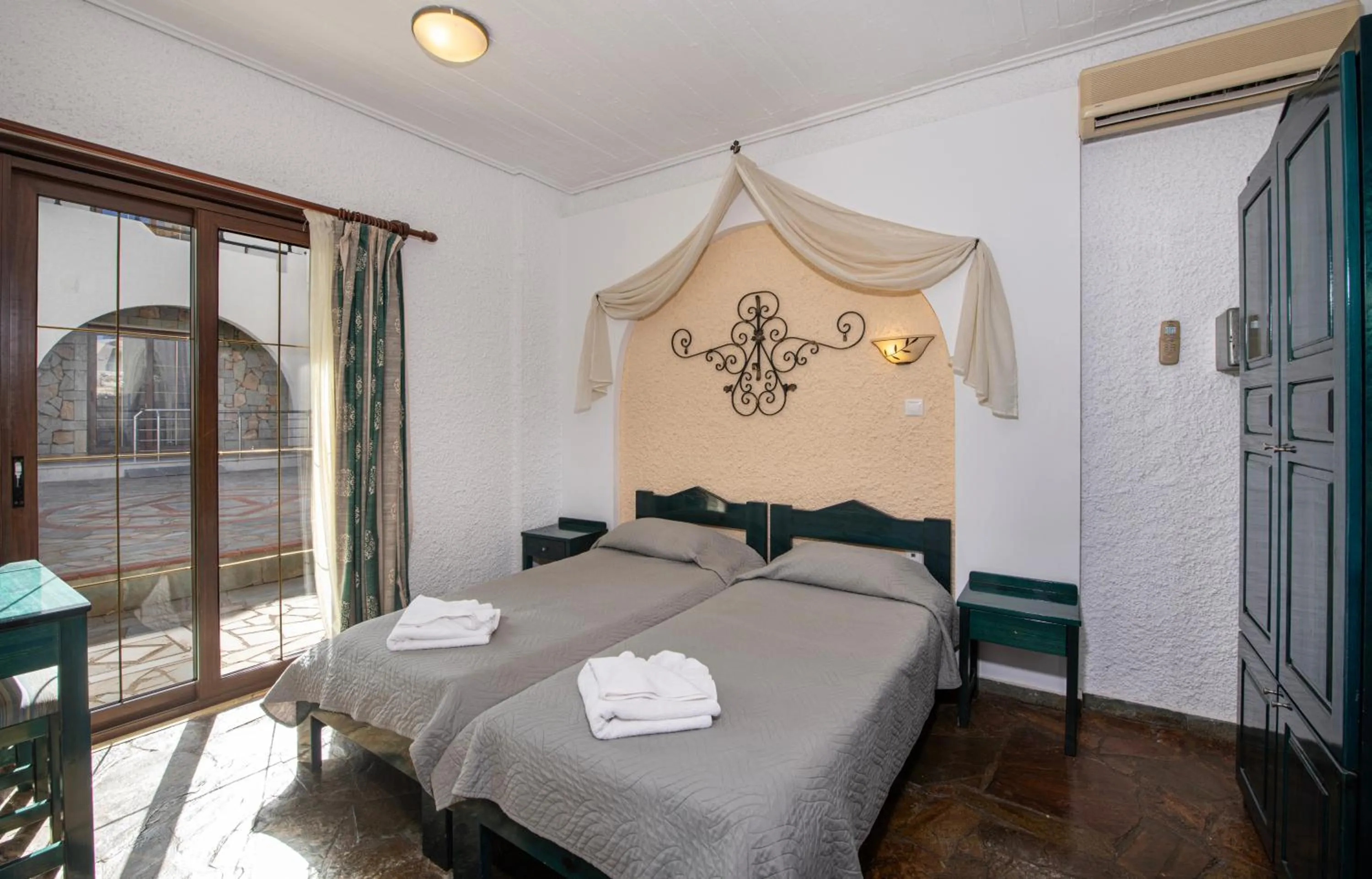 Bed in Castle Suites Hotel