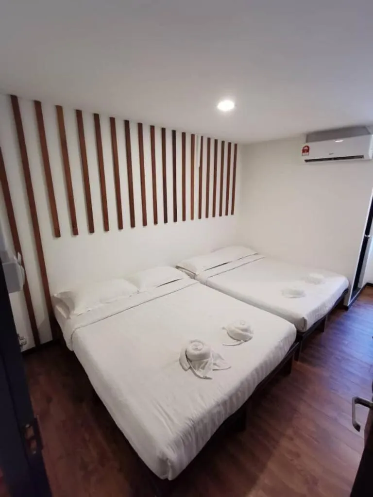 Bed in Kuching Hotel