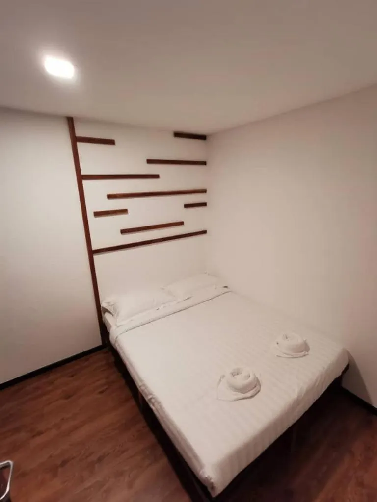 Bed in Kuching Hotel