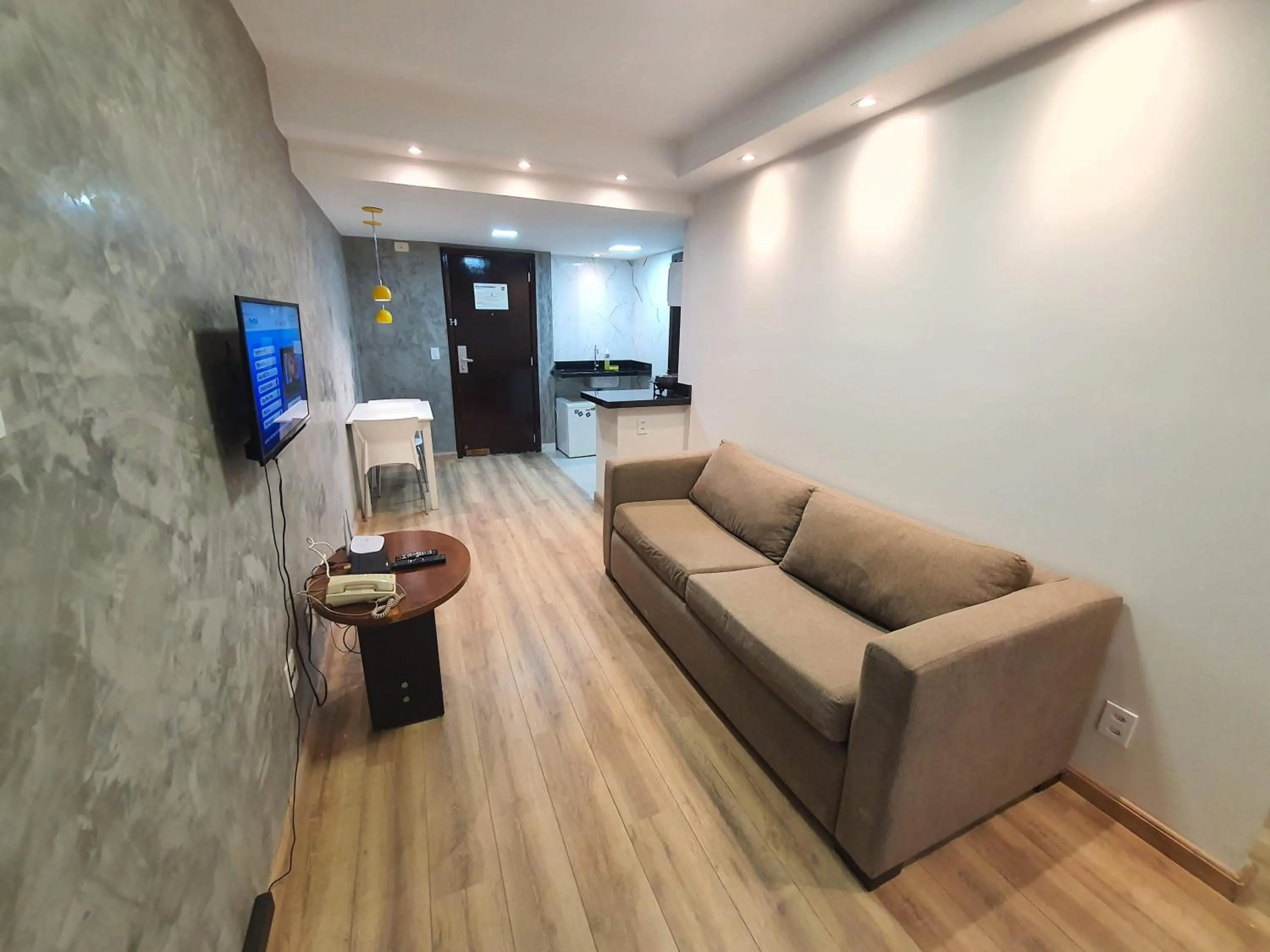 Communal lounge/ TV room in Lake Side Beira do Lago - piscina - academia - sauna- By Rei dos Flats