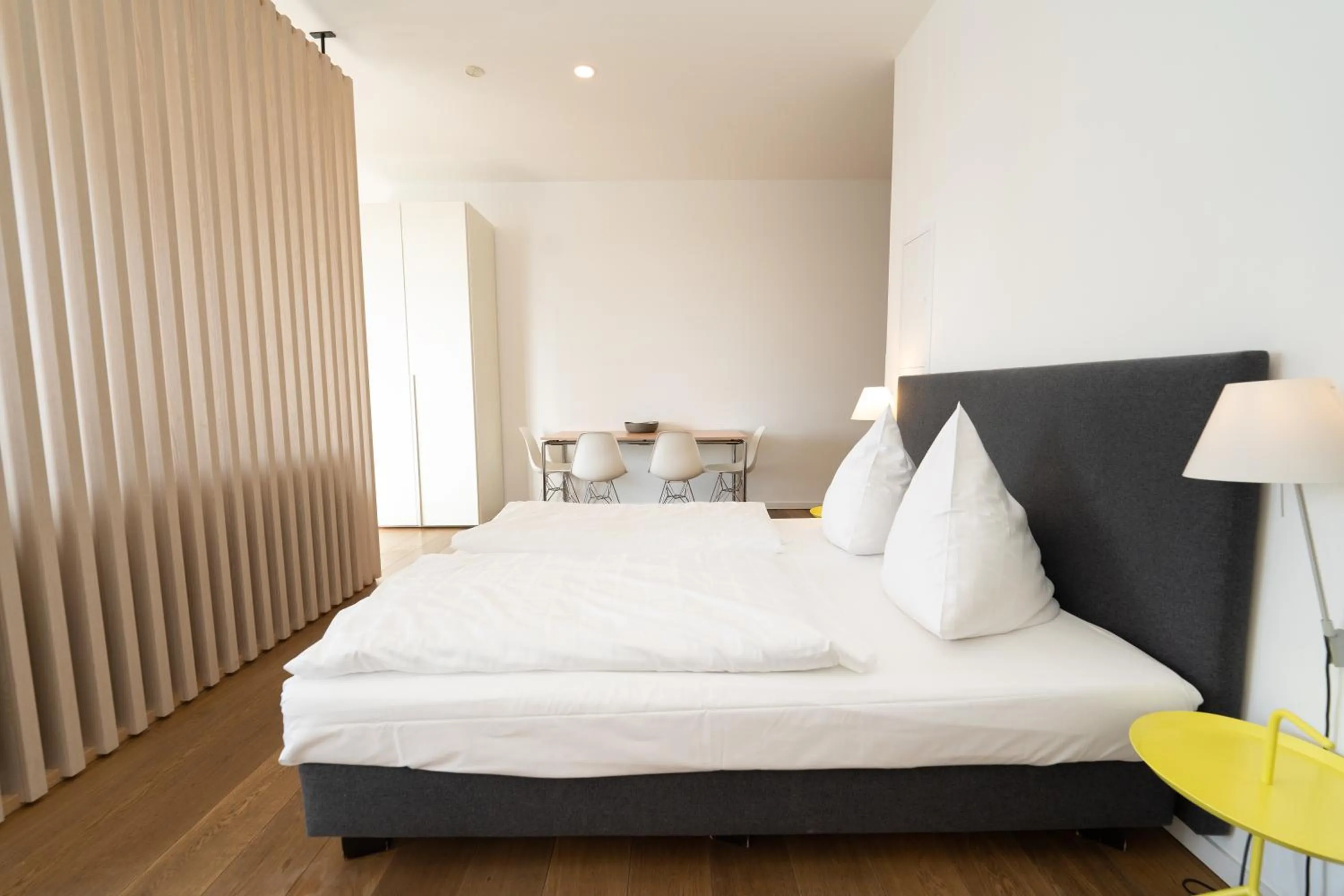 Bed in Das Loft Apartments