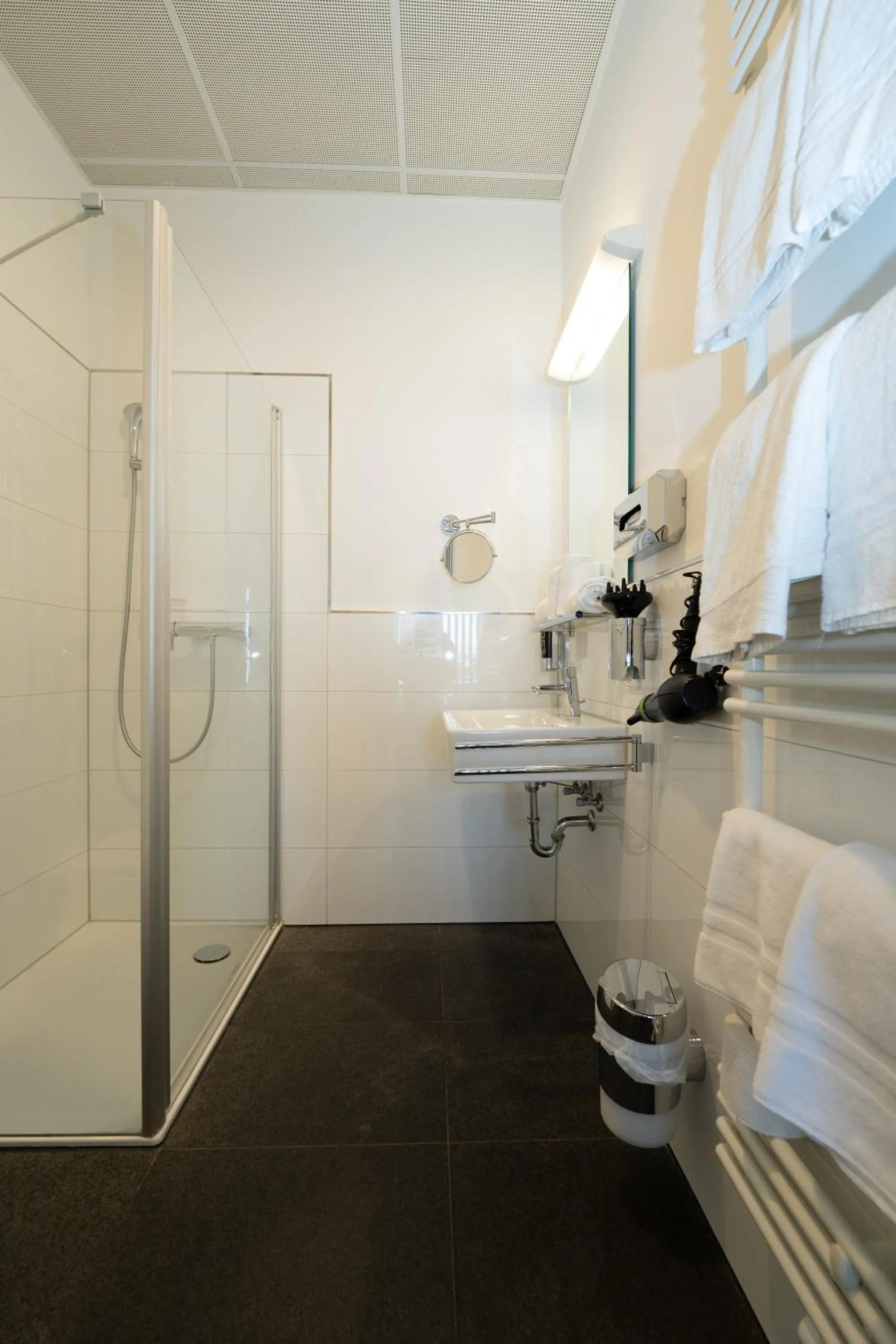 Shower in Das Loft Apartments