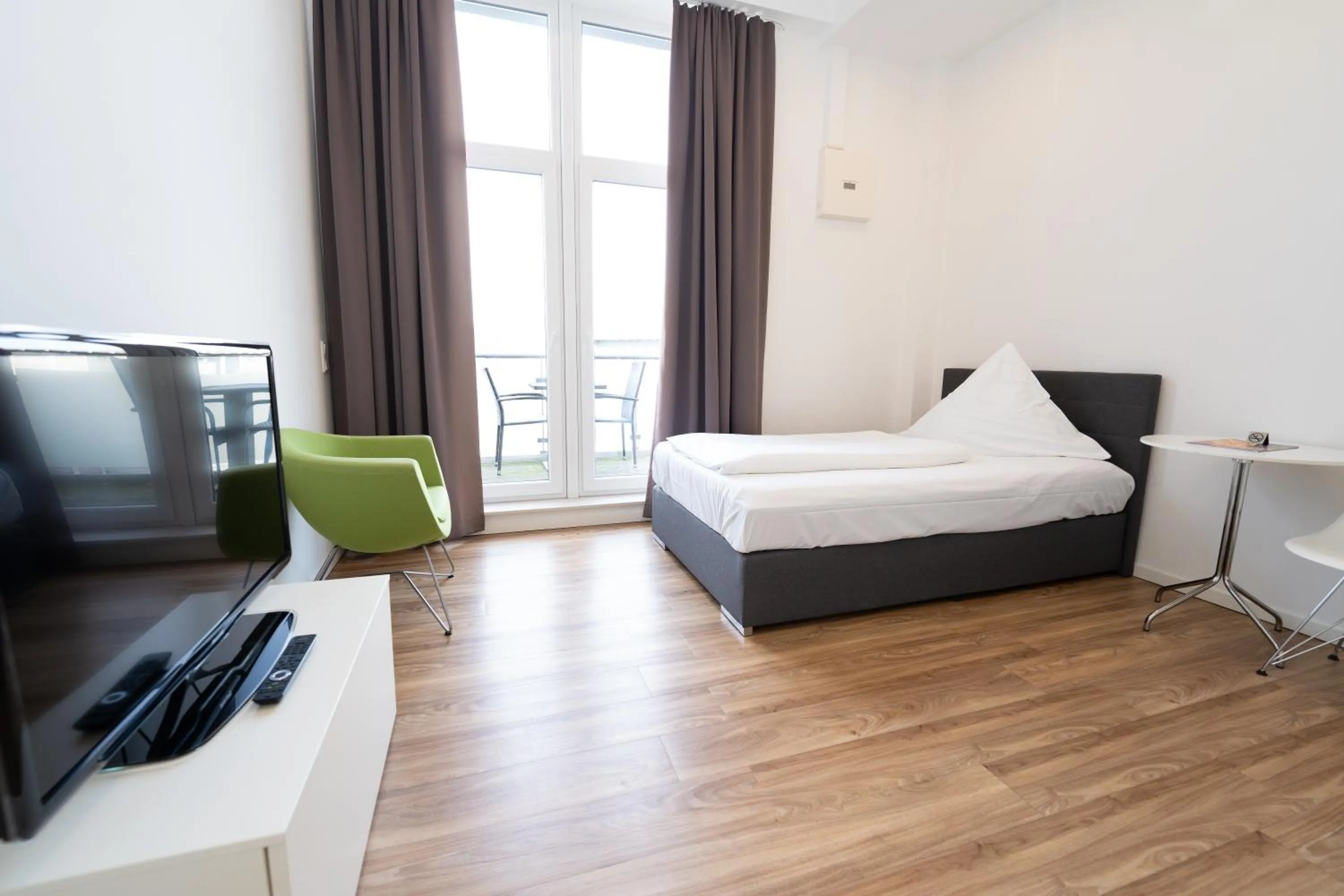 Balcony/Terrace, Bed in Das Loft Apartments