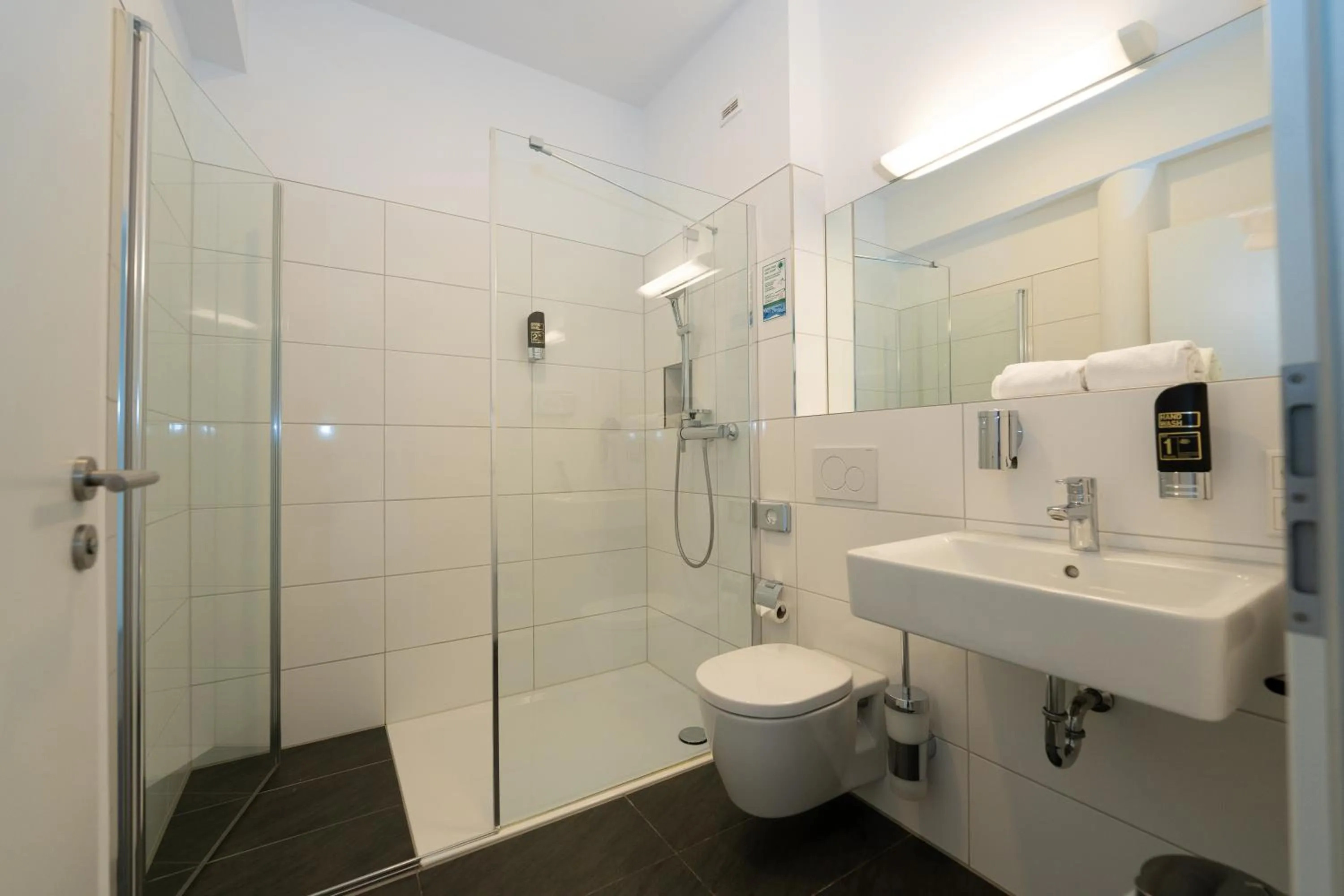 Shower in Das Loft Apartments