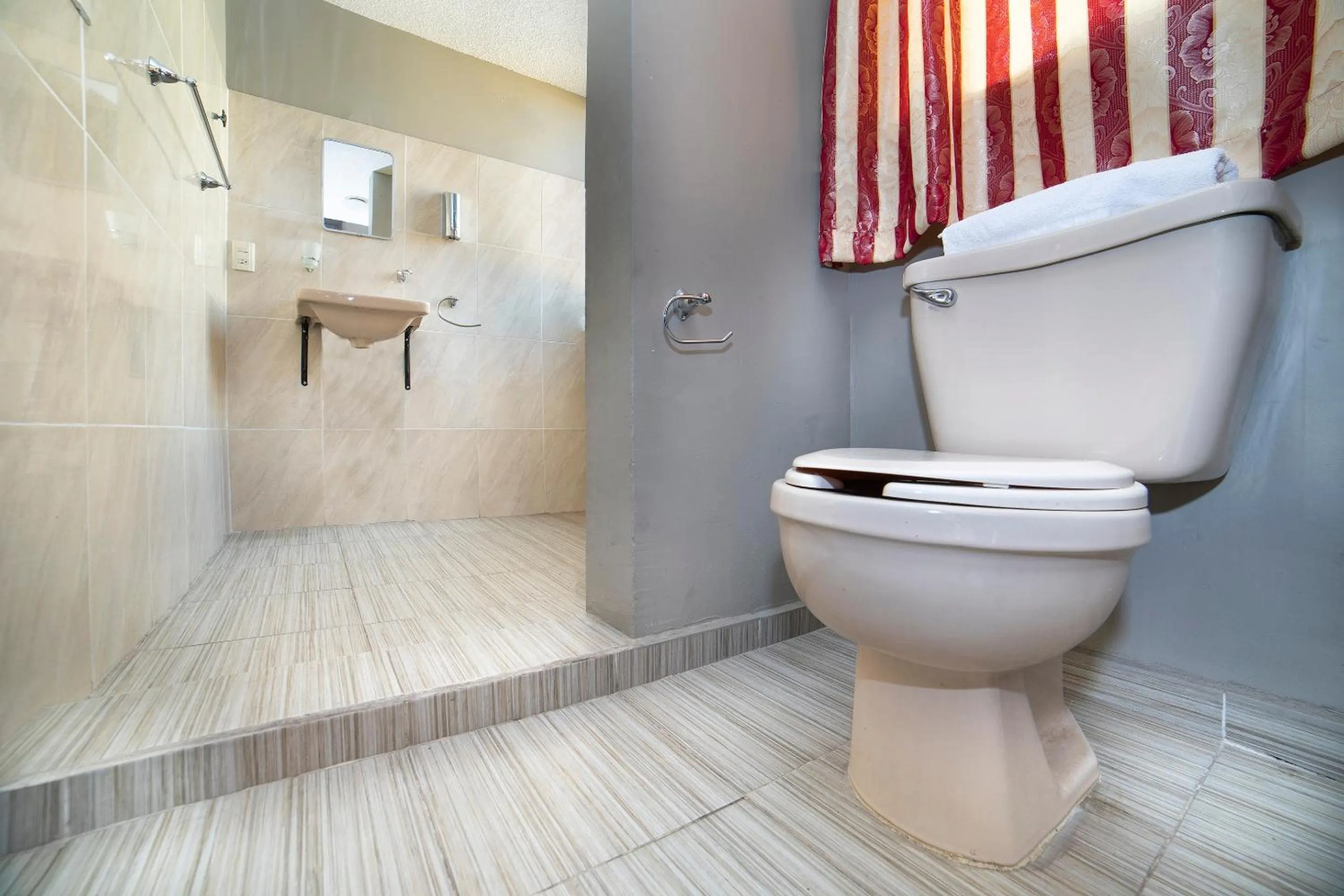 Bathroom in Capital O Hotel Diez