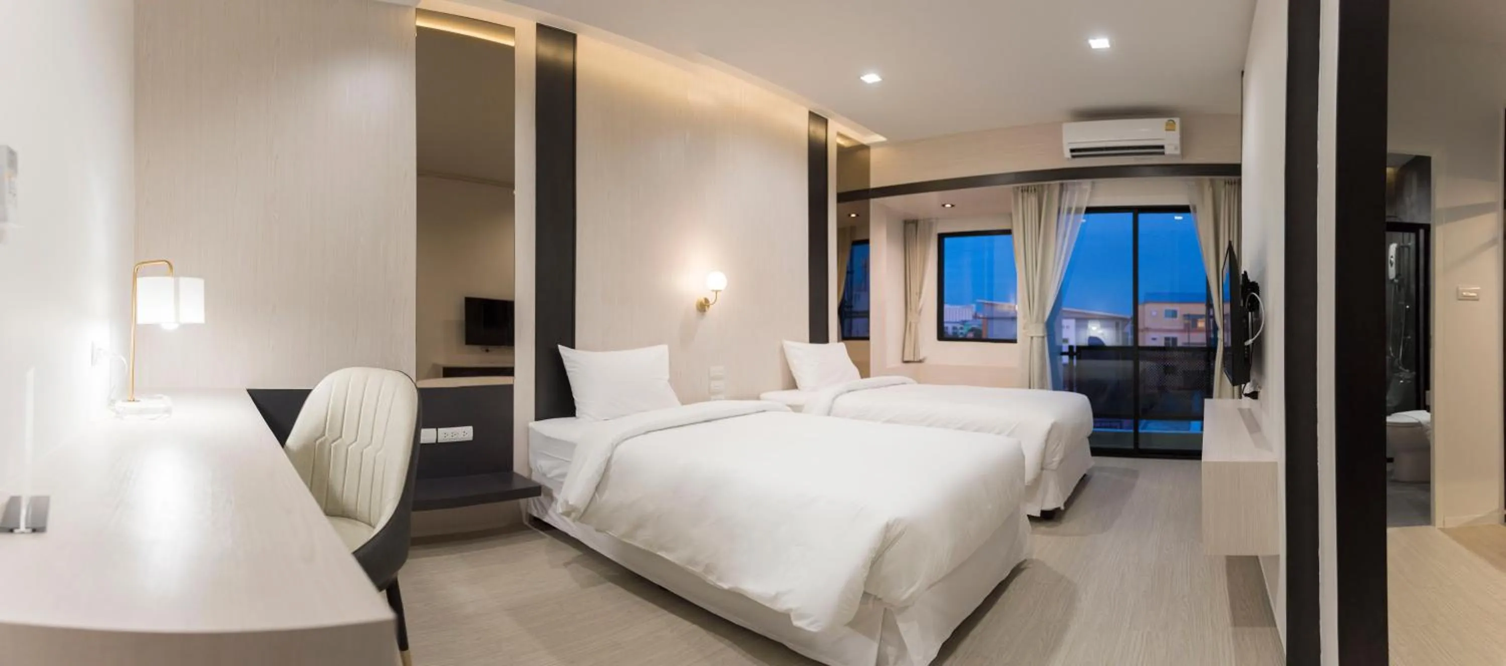 Bed in Qlosest Hotel