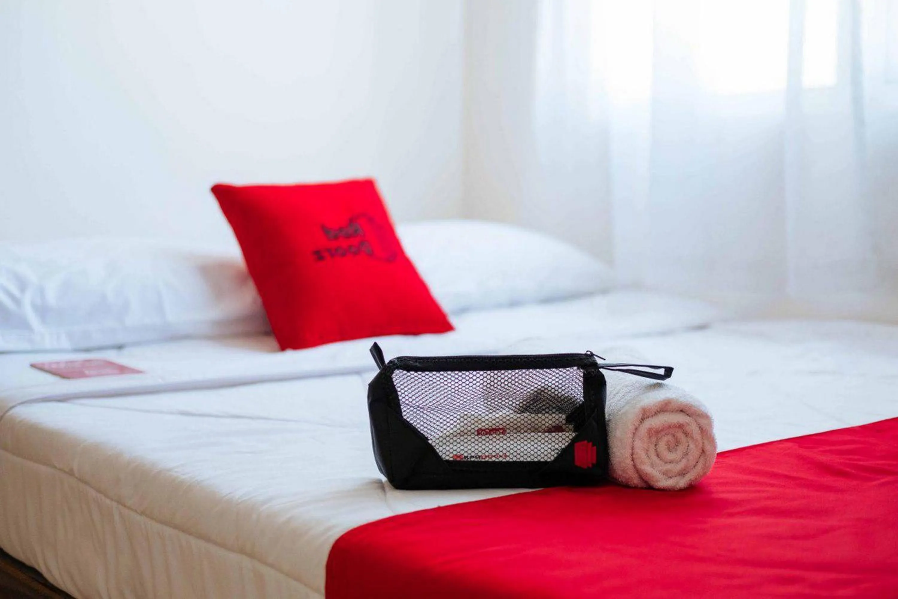 Bed in RedDoorz near Lampung Walk 2