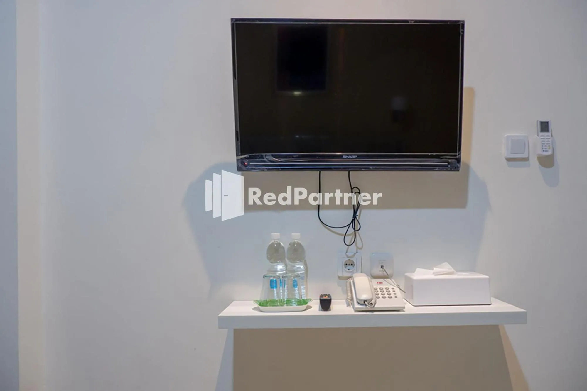 TV and multimedia in Rit's Garden At CitraGrand Semarang Mitra RedDoorz