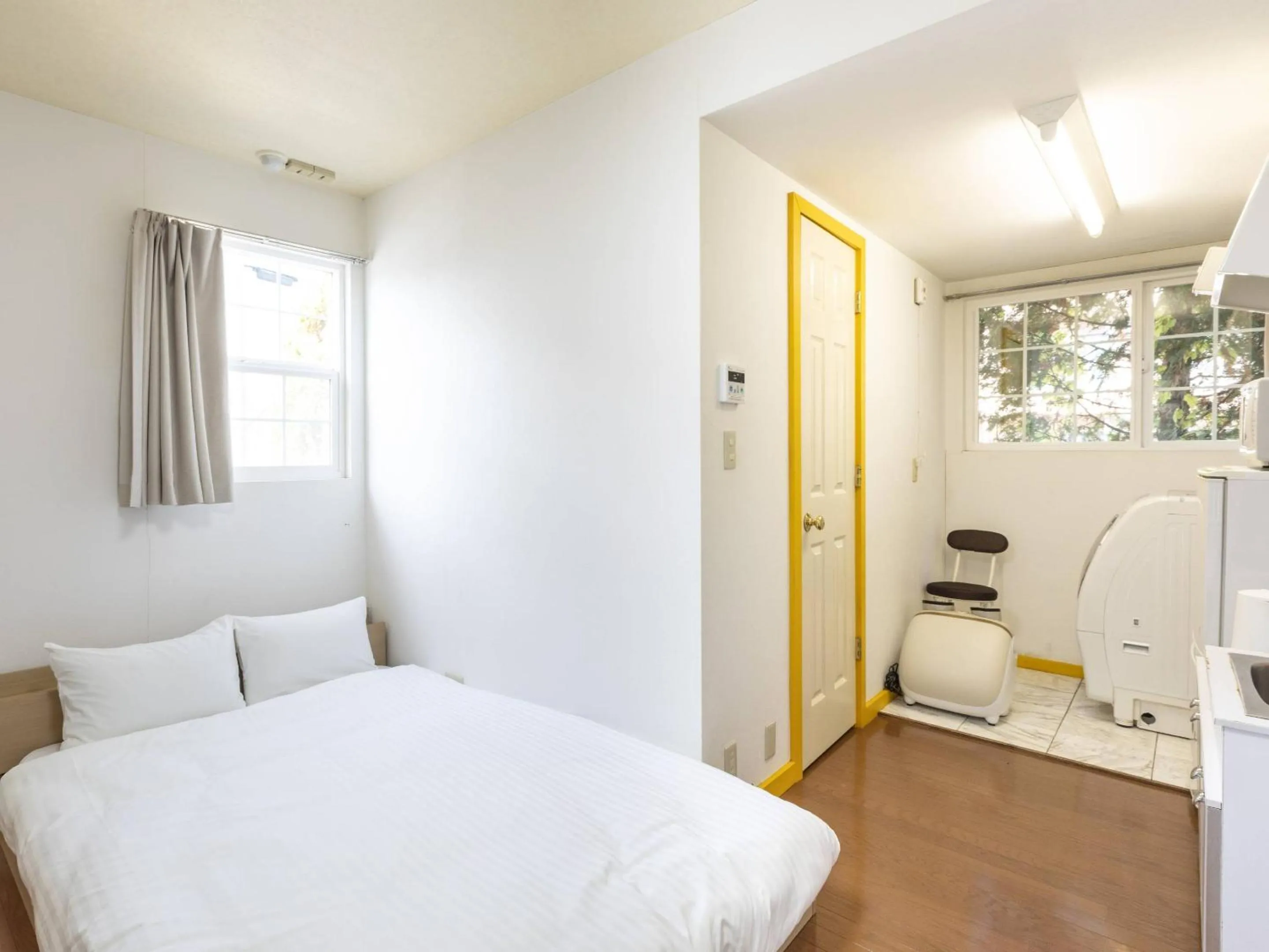 Bed in Bluebird Hotel