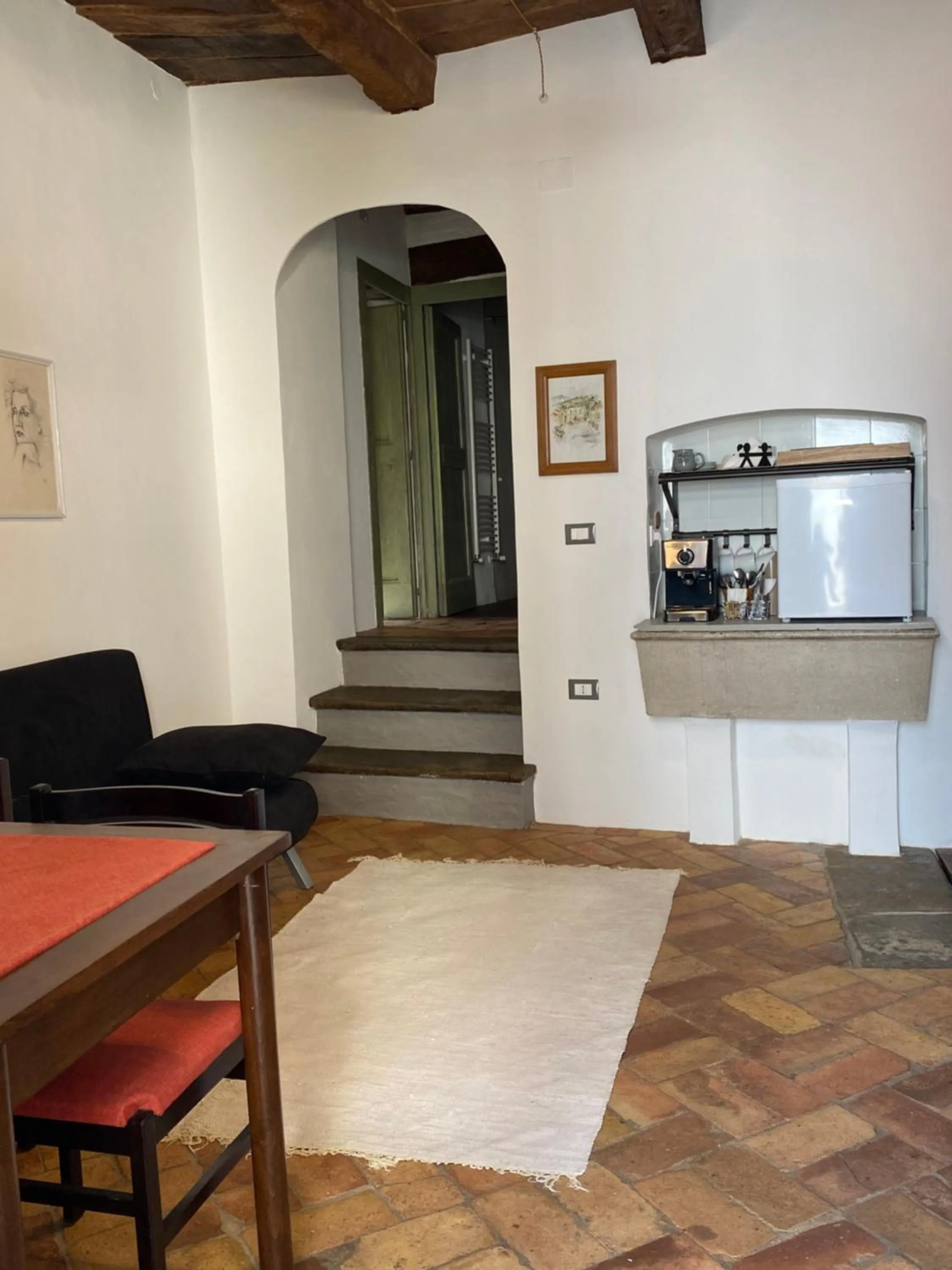 Communal lounge/ TV room in B&B Donna Livia