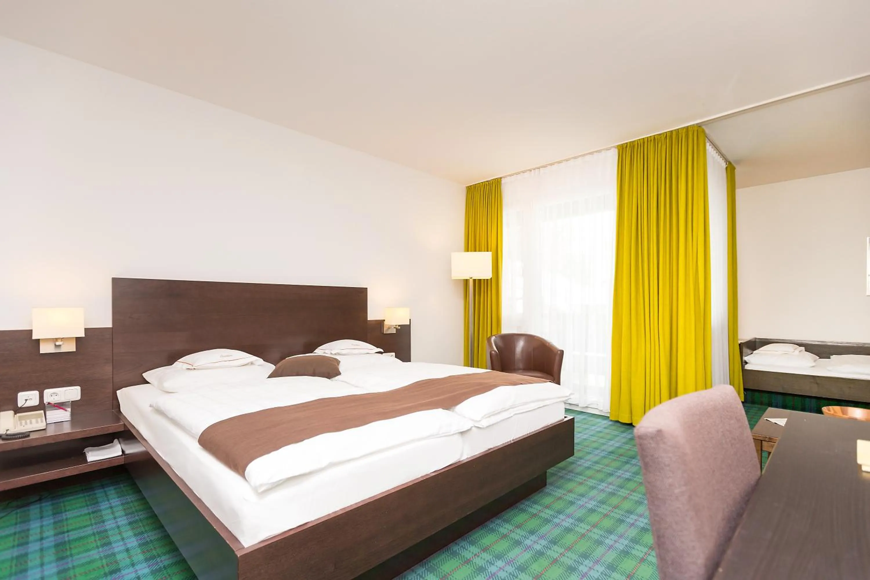 Photo of the whole room, Bed in Hotel Alpenhof Postillion