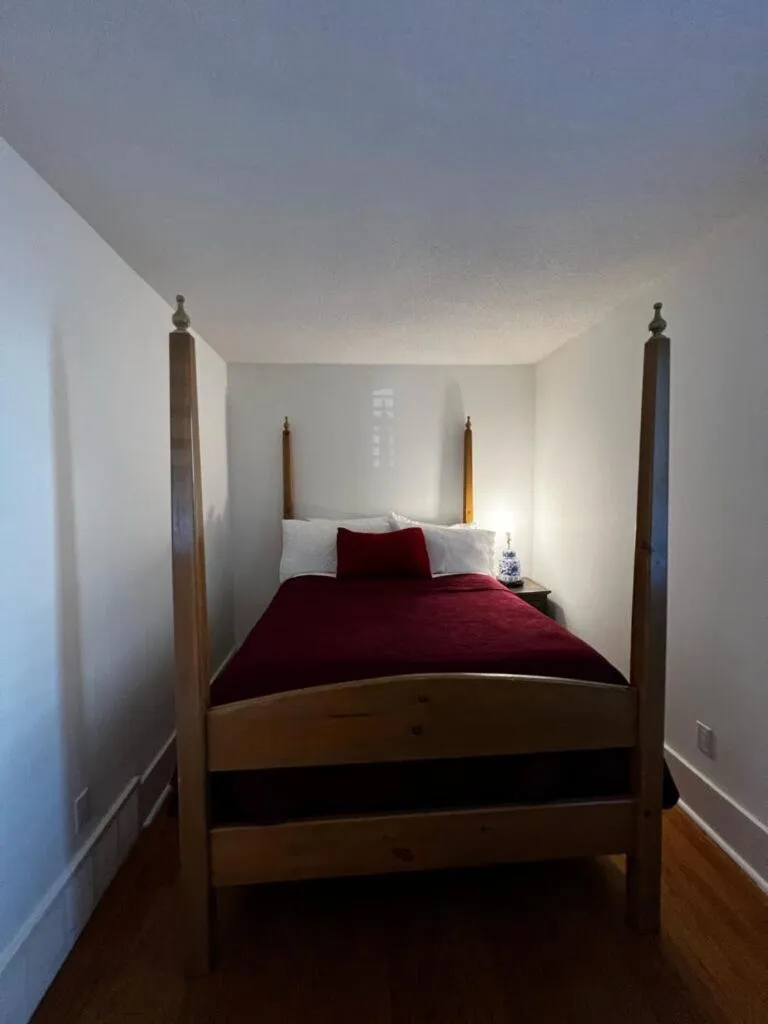 Bed in The Olde Angel Inn