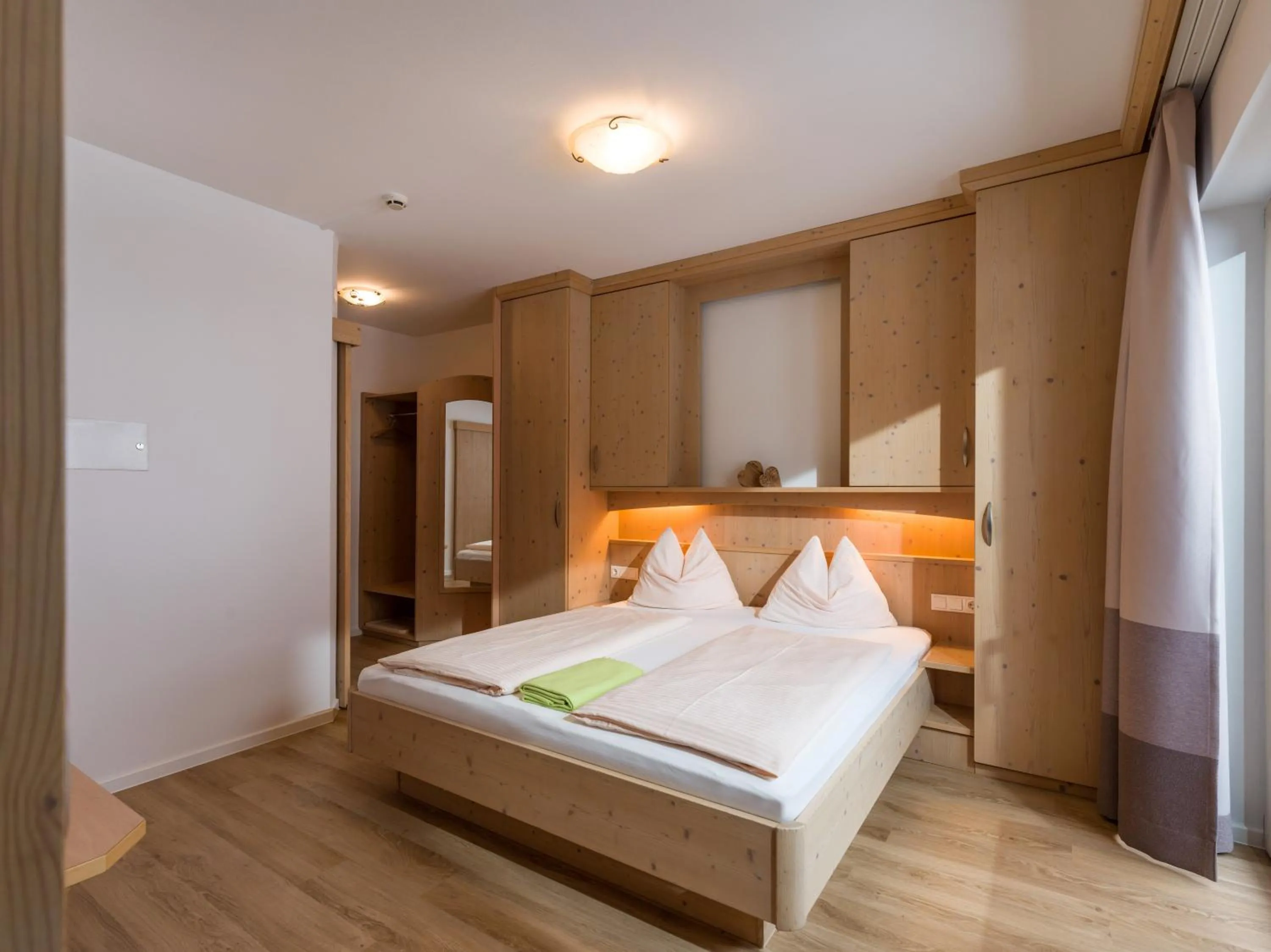 Bedroom, Bed in Aparthotel Brandauerhof