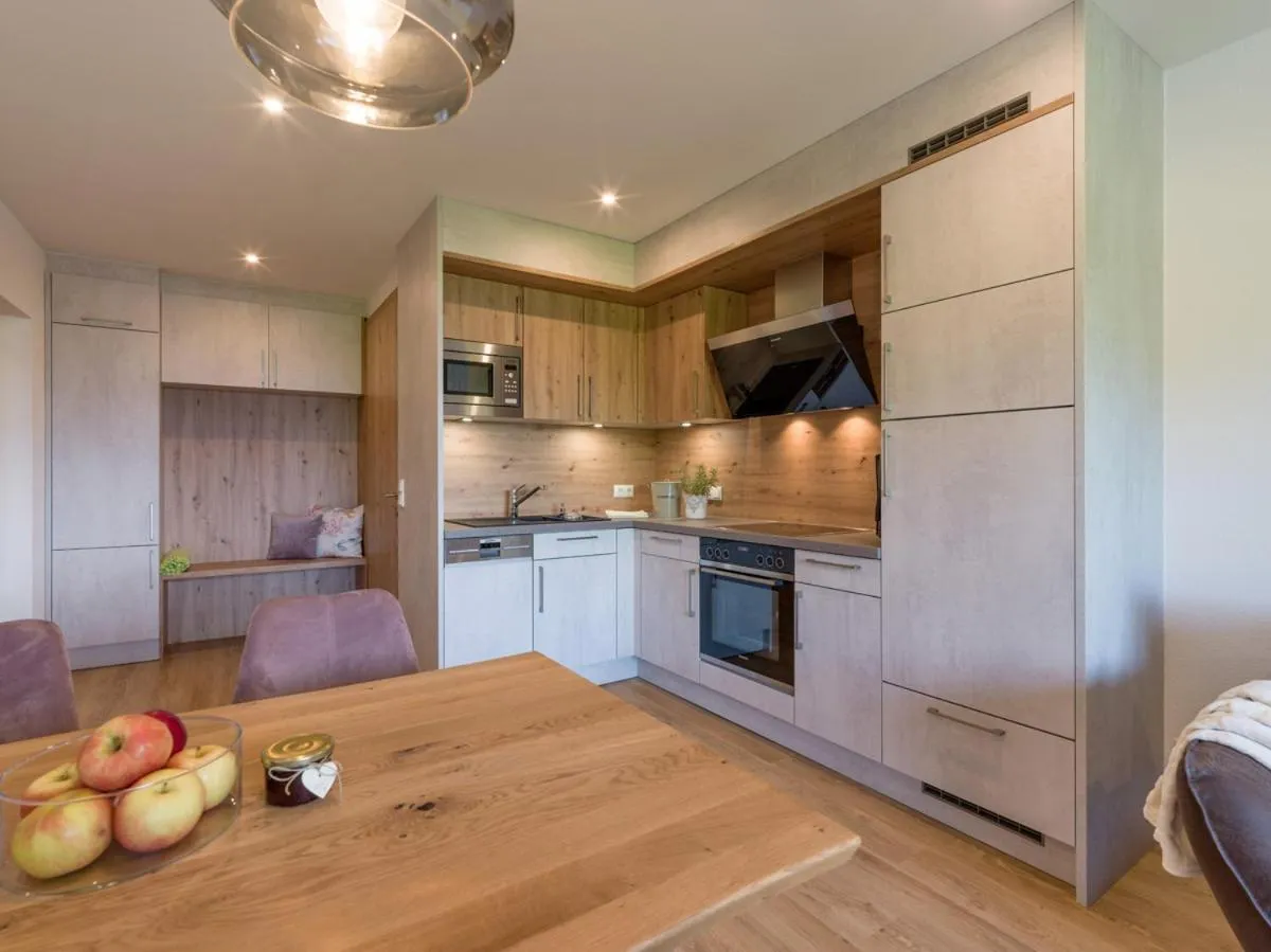 Kitchen or kitchenette in Aparthotel Brandauerhof