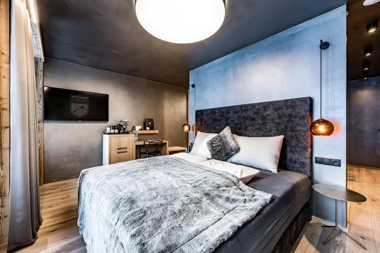 Bed in ALMMONTE PRÄCLARUM SUITES - Casual Boutique Hotel