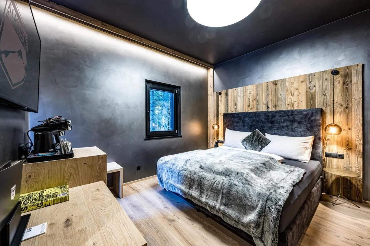 Bed in ALMMONTE PRÄCLARUM SUITES - Casual Boutique Hotel