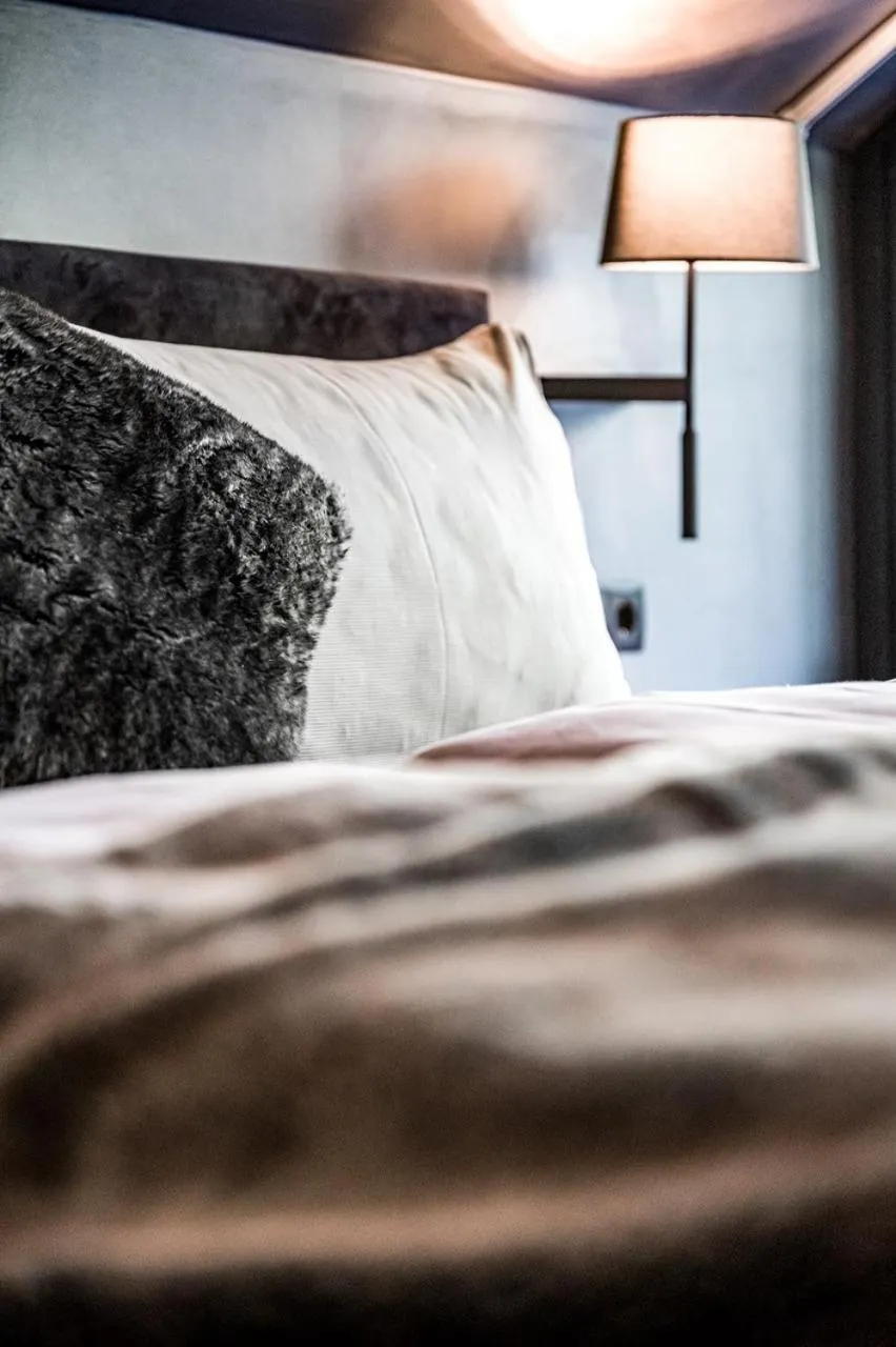 Bed in ALMMONTE PRÄCLARUM SUITES - Casual Boutique Hotel