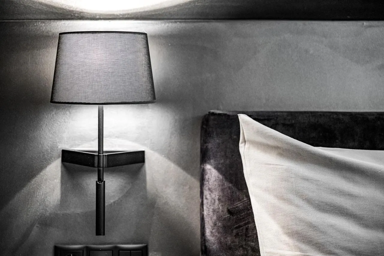 Bed in ALMMONTE PRÄCLARUM SUITES - Casual Boutique Hotel