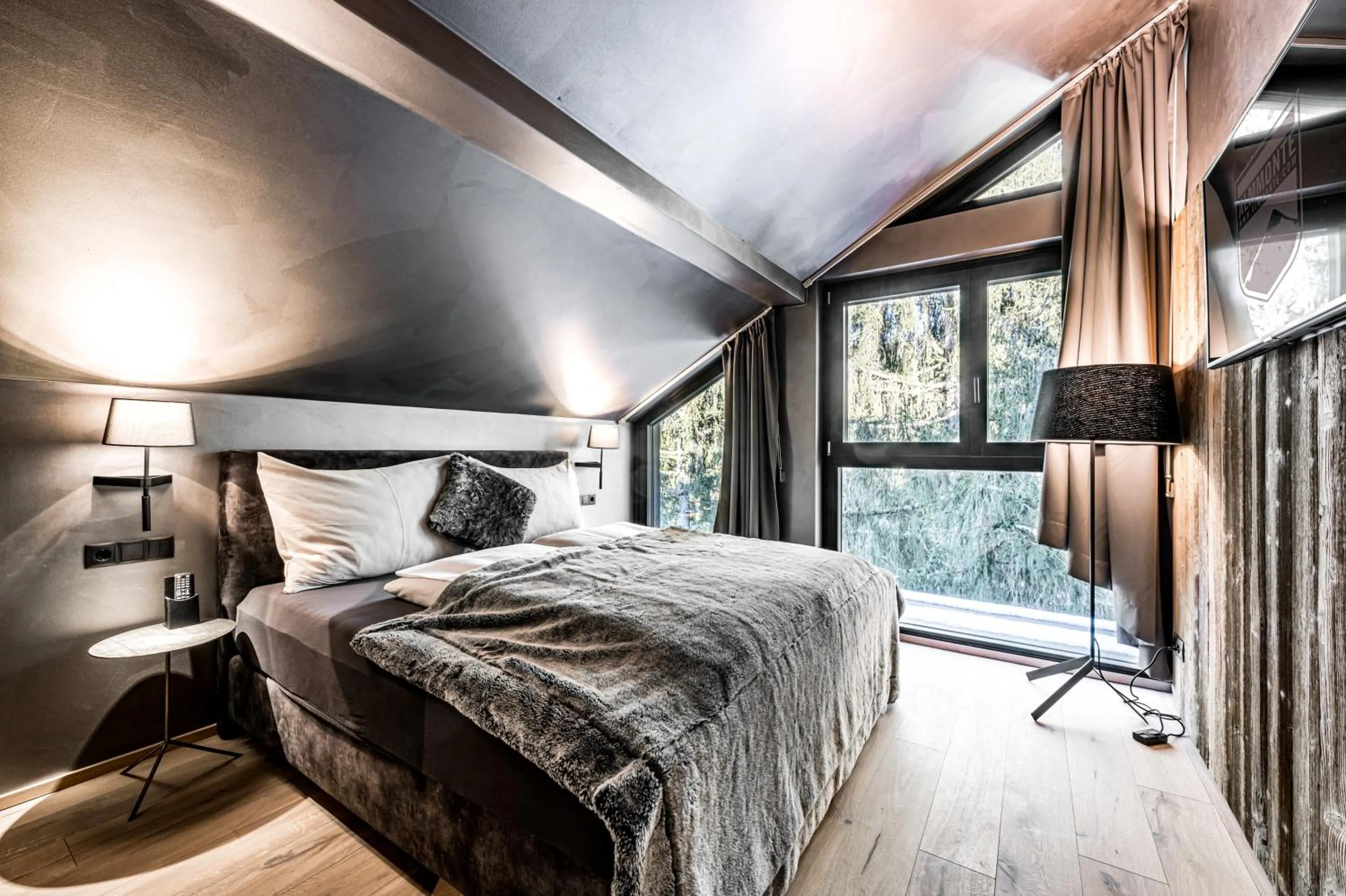 Bed in ALMMONTE PRÄCLARUM SUITES - Casual Boutique Hotel