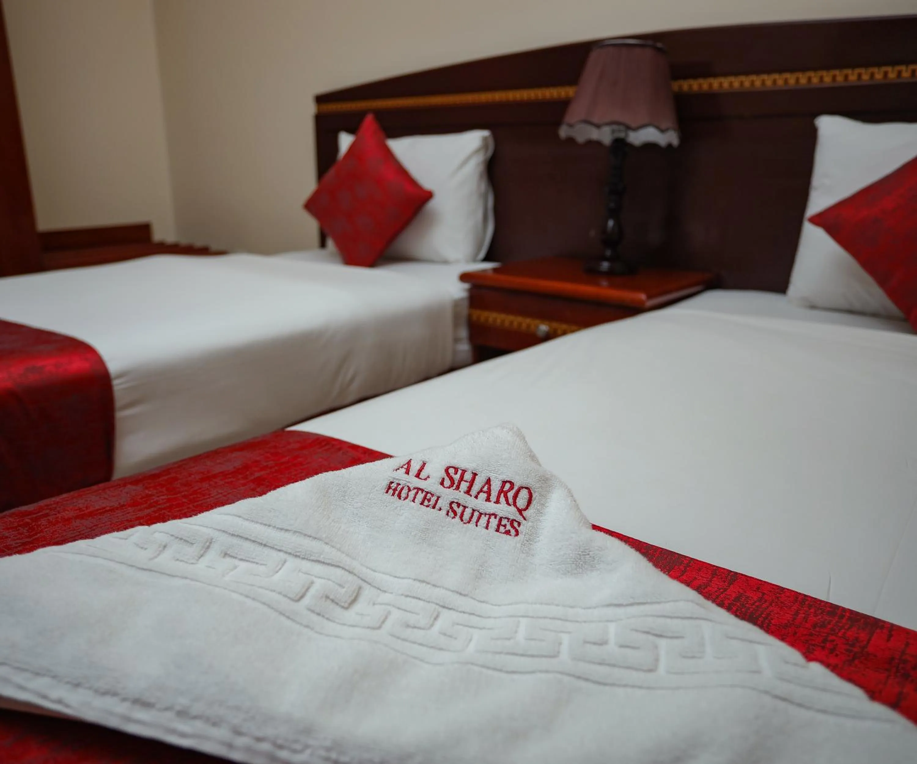 Bed in Al Sharq Hotels Suites