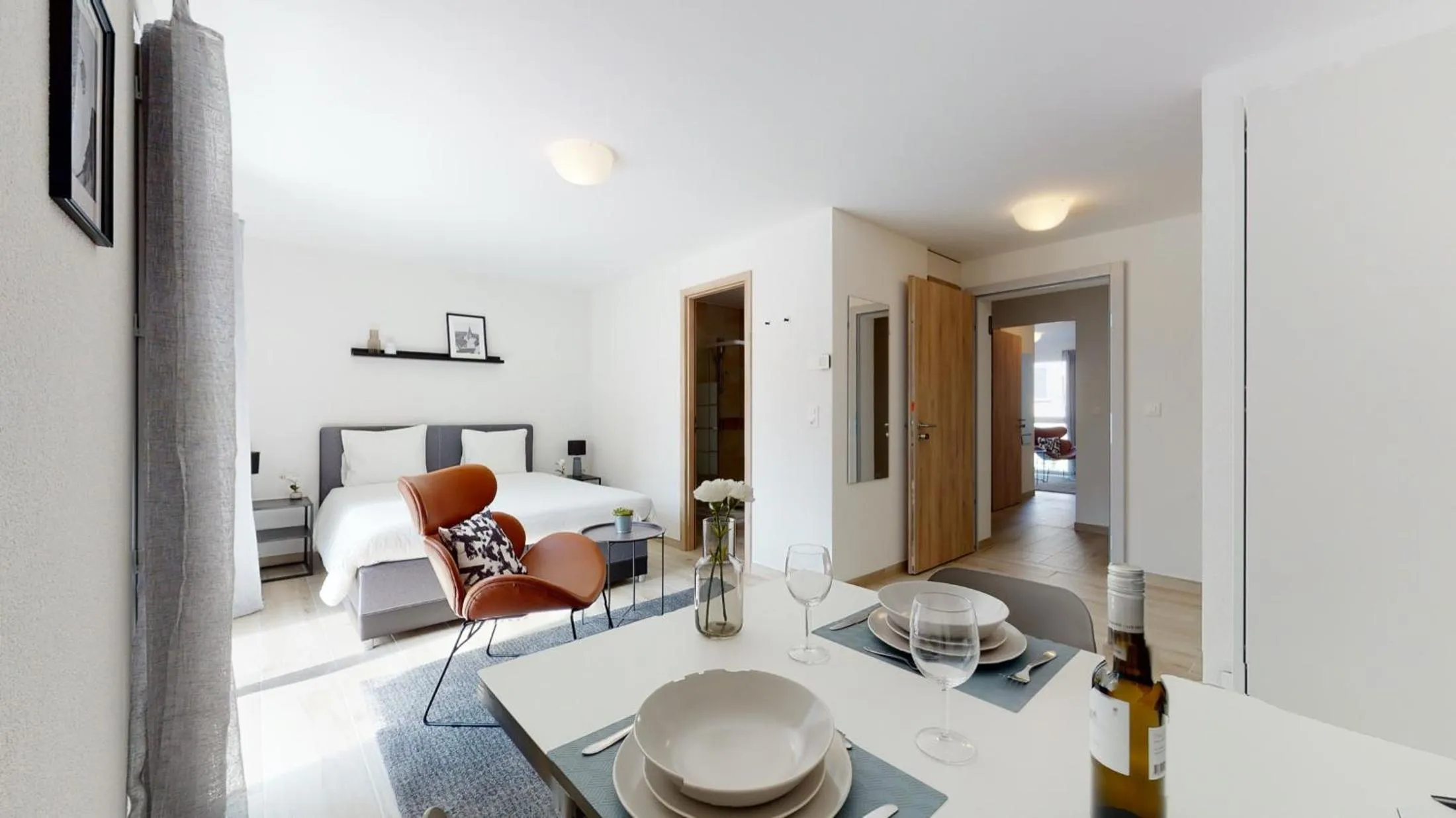 Bedroom in Nonanteneuf appart hōtel Aigle - contactless check-in