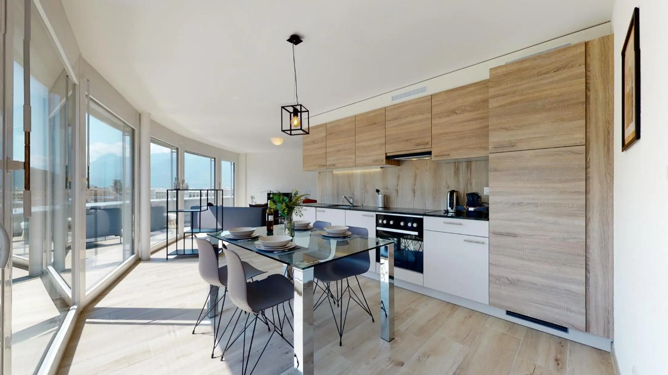 Kitchen or kitchenette in Nonanteneuf appart hōtel Aigle - contactless check-in