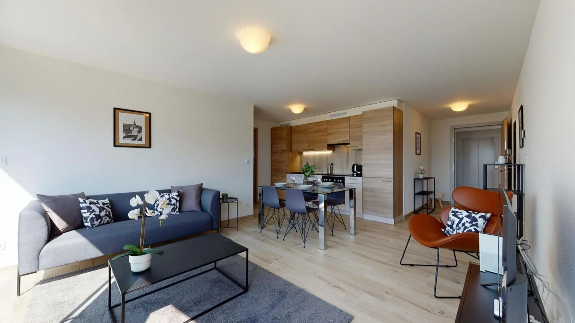 Living room in Nonanteneuf appart hōtel Aigle - contactless check-in