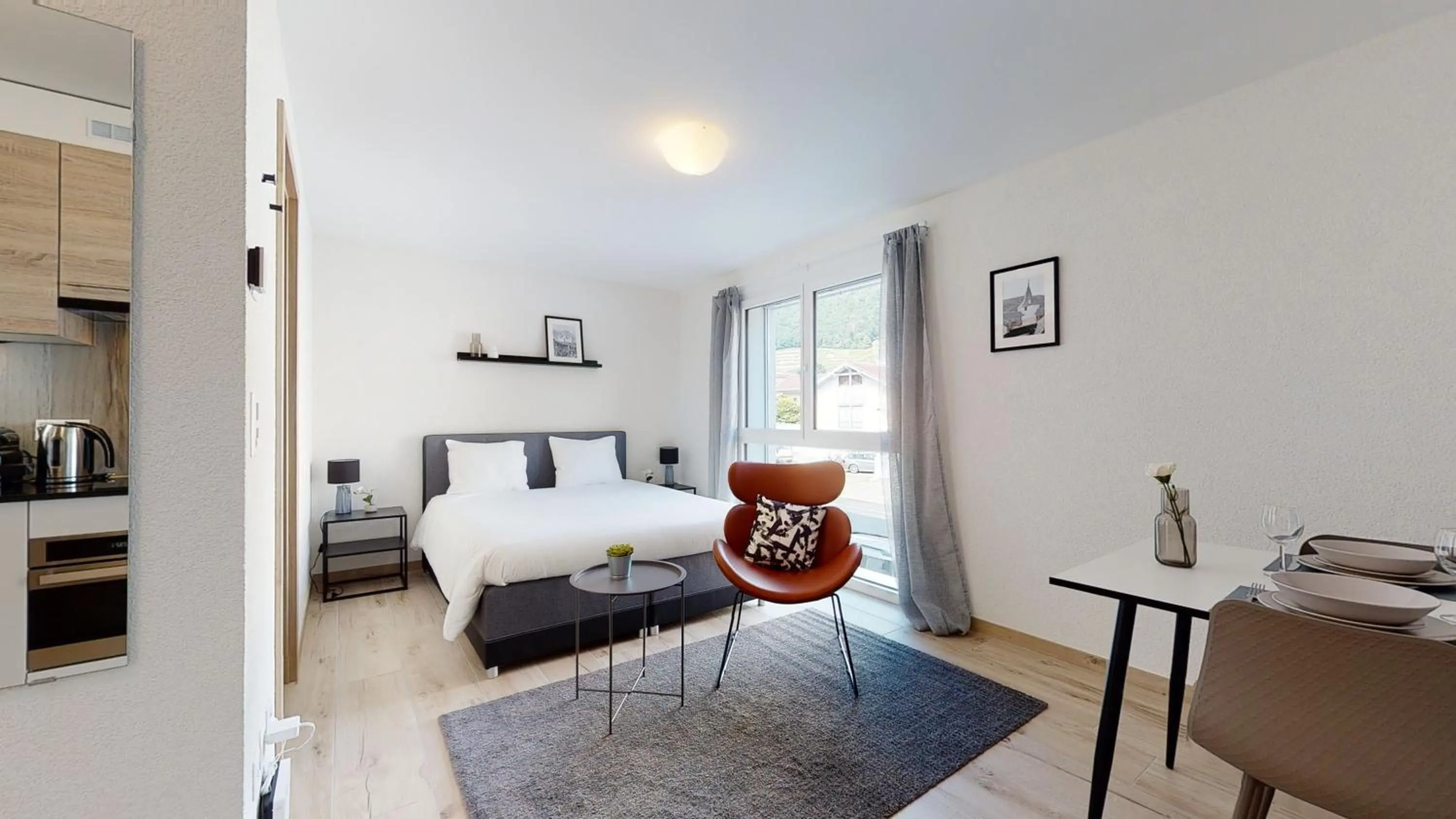 Living room, Bed in Nonanteneuf appart hōtel Aigle - contactless check-in