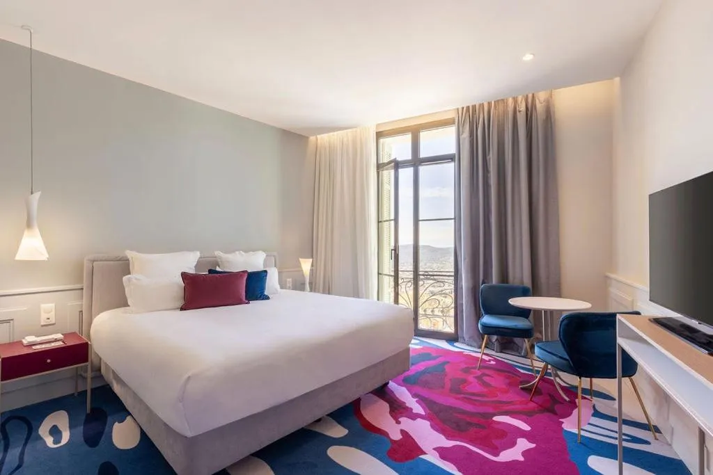 Bed in Eden Rose Grand Hotel BW Premier Collection